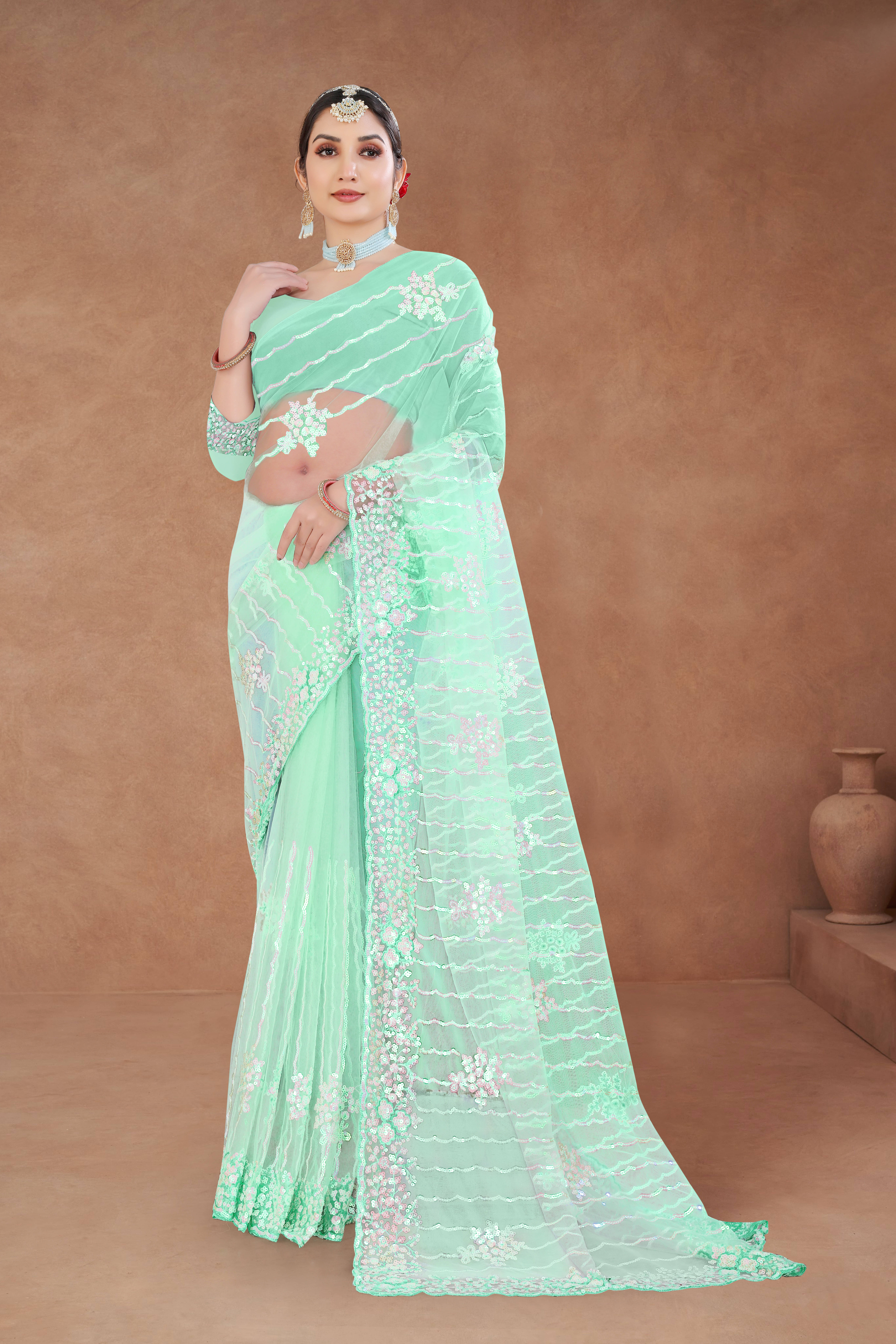     			Sitanjali Net Embellished Saree With Unstitched Blouse Piece ( Teal )
