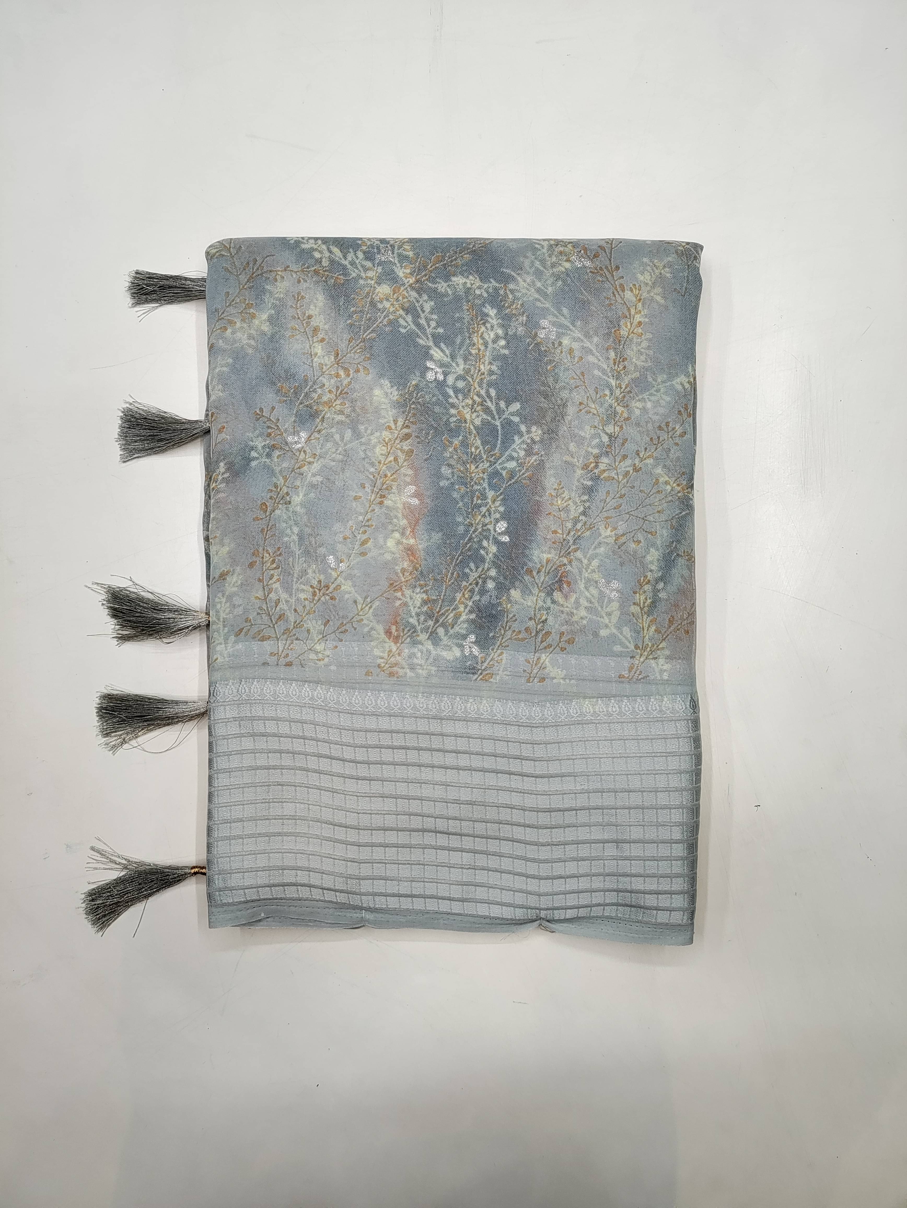 RekhaManiyar Georgette Printed Saree With Unstitched Blouse Piece ( Grey ) RekhaManiyar Georgette Printed Saree With Unstitched Blouse Piece ( Grey )