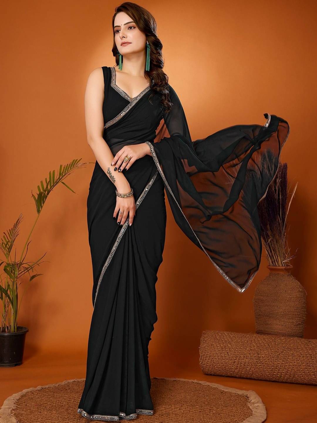 PHORIA STYLE Georgette Solid Saree With Unstitched Blouse Piece ( Black ) PHORIA STYLE Georgette Solid Saree With Unstitched Blouse Piece ( Black )