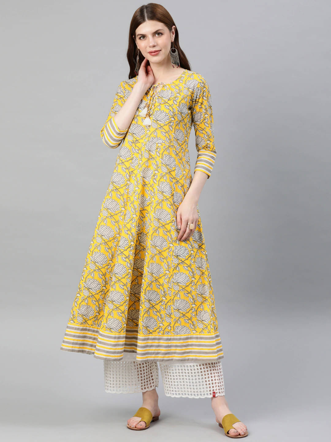 Yash Gallery Pack of 1 Cotton Printed Anarkali Women's Kurti - ( Yellow ) Yash Gallery Pack of 1 Cotton Printed Anarkali Women's Kurti - ( Yellow )