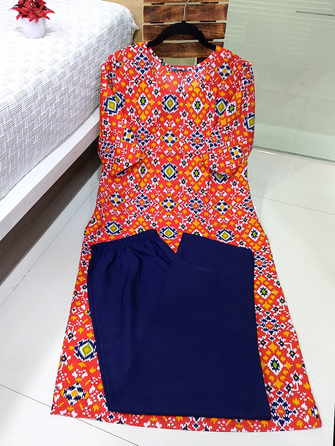 1 Stop Fashion Crepe Printed Kurti With Pants Women's Stitched Salwar Suit - Red ( Pack of 1 )     			1 Stop Fashion Crepe Printed Kurti With Pants Women's Stitched Salwar Suit - Red ( Pack of 1 )