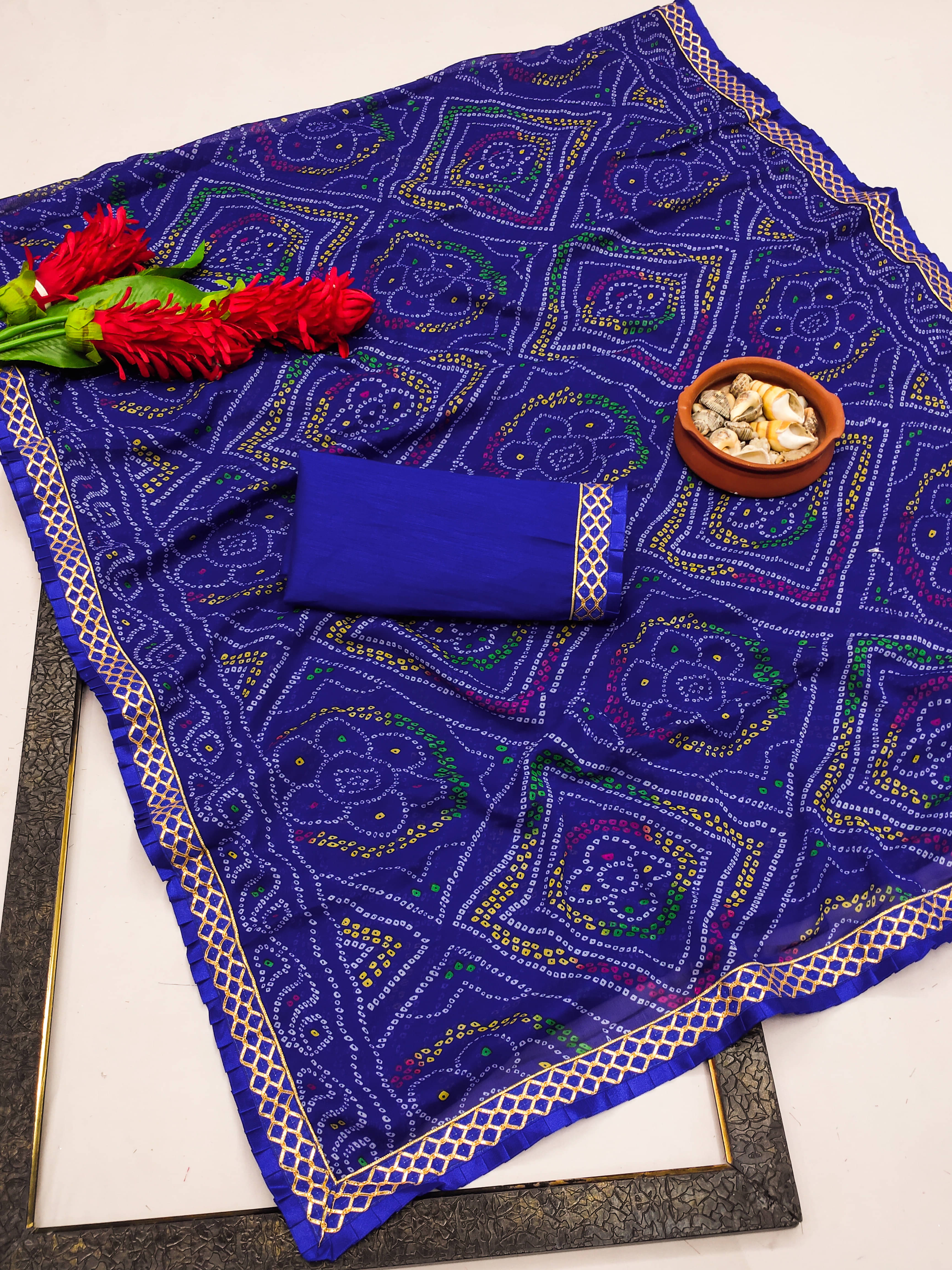 Kanooda Prints Georgette Printed Saree With Unstitched Blouse Piece ( Blue ) Kanooda Prints Georgette Printed Saree With Unstitched Blouse Piece ( Blue )