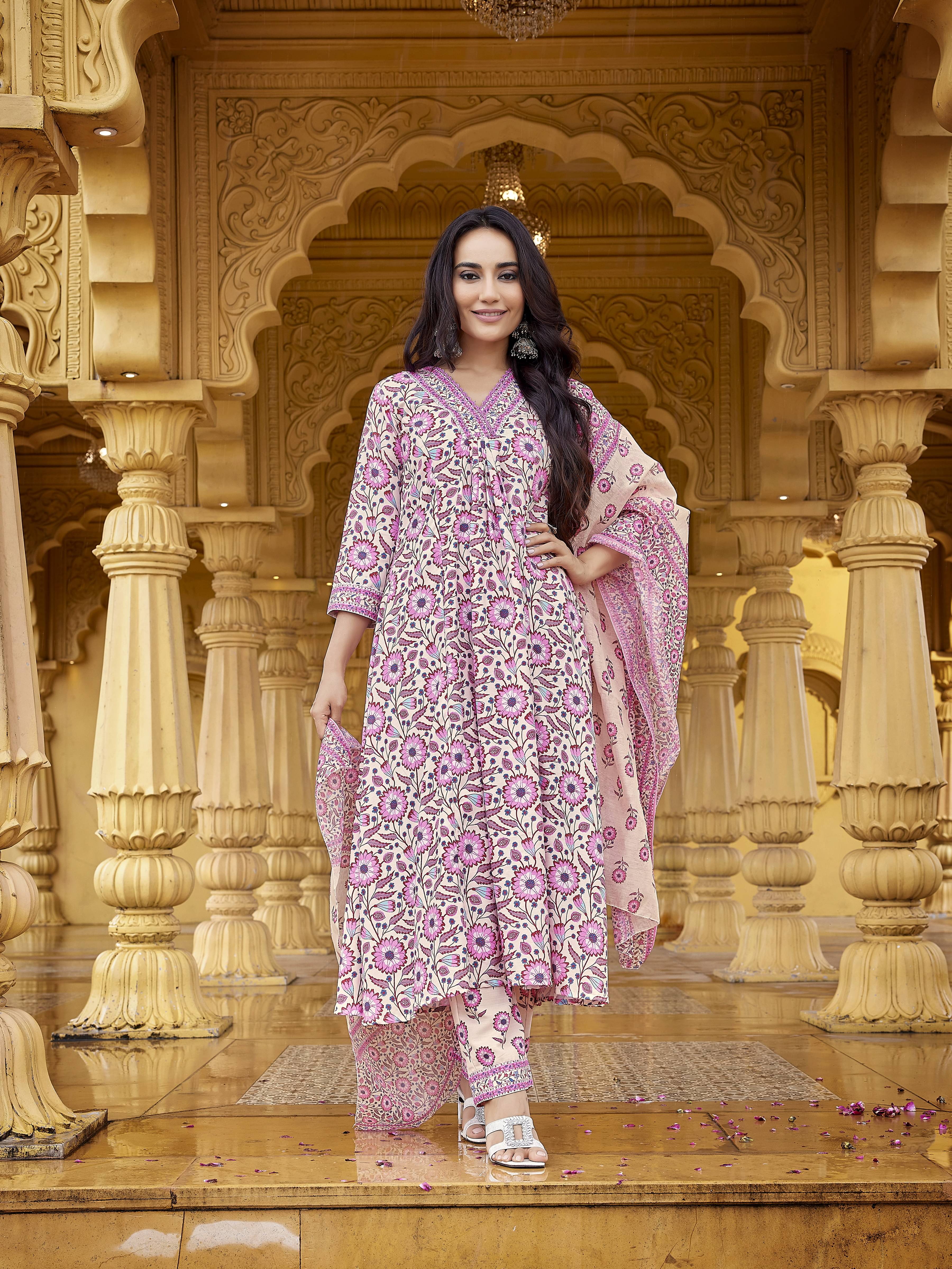 Royal Export Viscose Printed Kurti With Pants Women's Stitched Salwar Suit - Pink ( Pack of 1 )     			Royal Export Viscose Printed Kurti With Pants Women's Stitched Salwar Suit - Pink ( Pack of 1 )