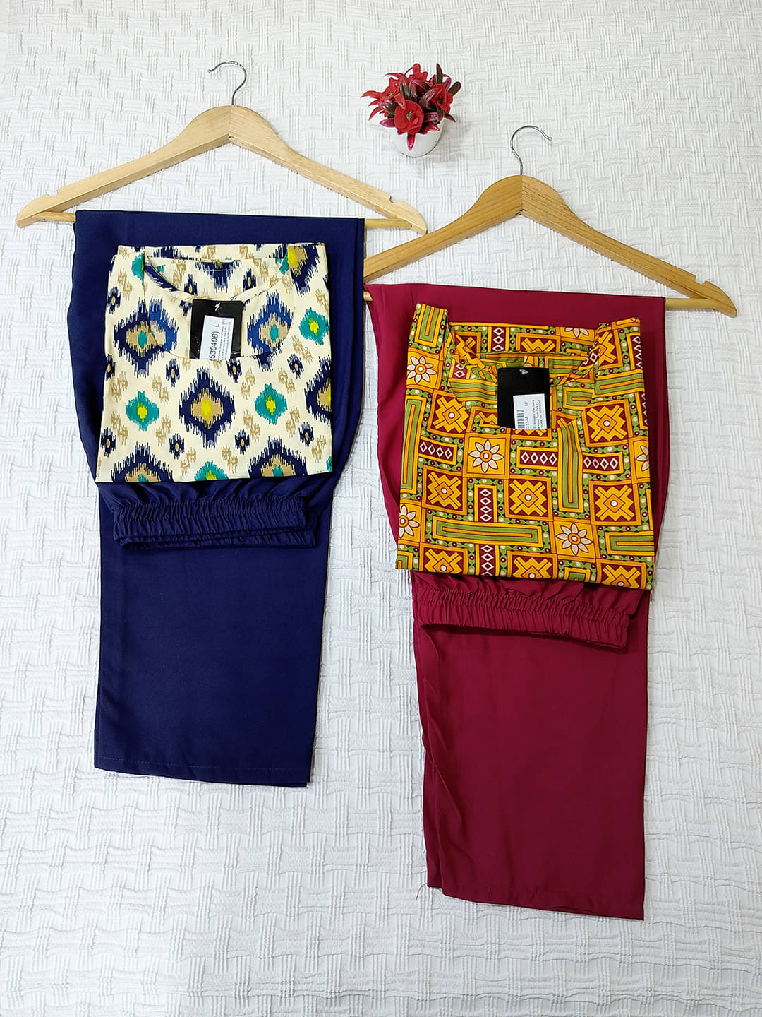 1 Stop Fashion Crepe Printed Kurti With Pants Women's Stitched Salwar Suit - White ( Pack of 2 )     			1 Stop Fashion Crepe Printed Kurti With Pants Women's Stitched Salwar Suit - White ( Pack of 2 )