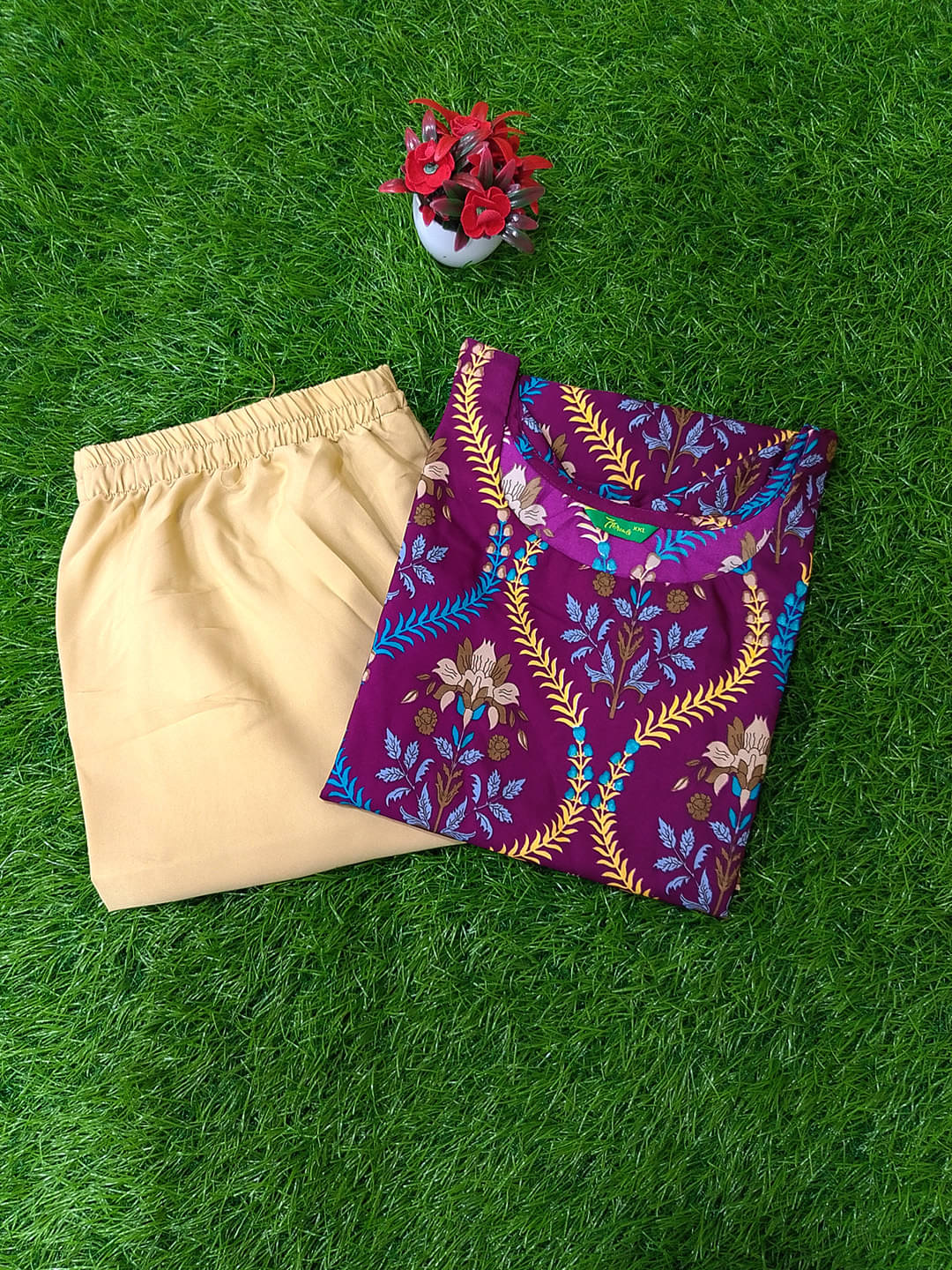 1 Stop Fashion Crepe Printed Kurti With Pants Women's Stitched Salwar Suit - Purple ( Pack of 1 )     			1 Stop Fashion Crepe Printed Kurti With Pants Women's Stitched Salwar Suit - Purple ( Pack of 1 )