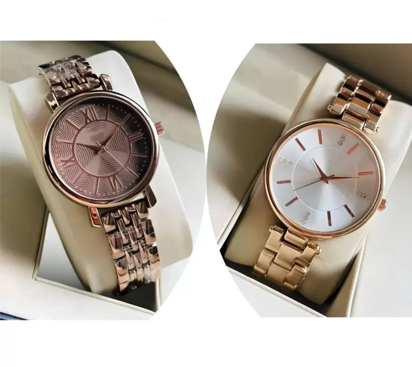     			EEWHI Rose Gold Metal Analog Womens Watch