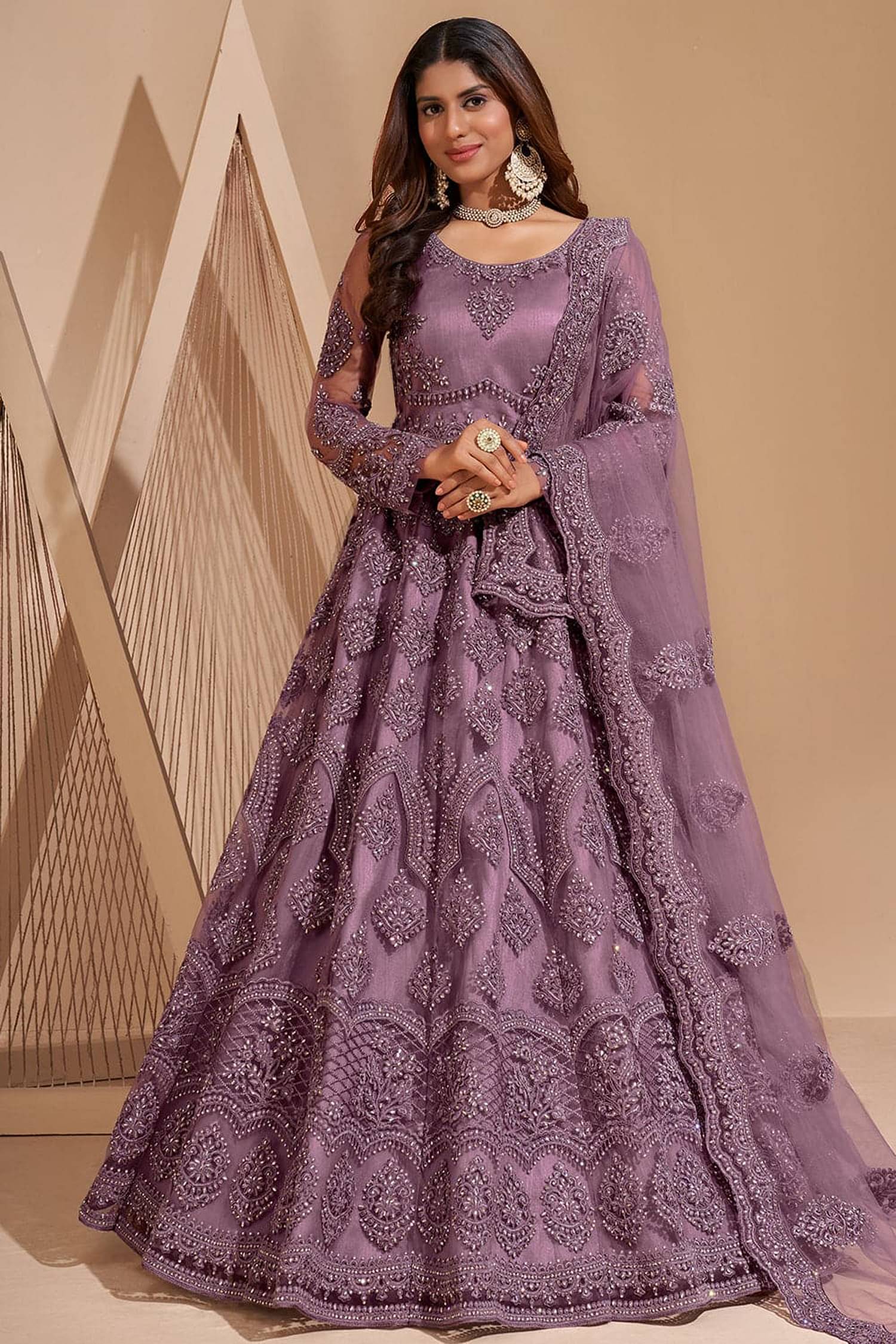 Apnisha Mauve Flared Net Women's Semi Stitched Ethnic Gown ( Pack of 1 ) Apnisha Mauve Flared Net Women's Semi Stitched Ethnic Gown ( Pack of 1 )