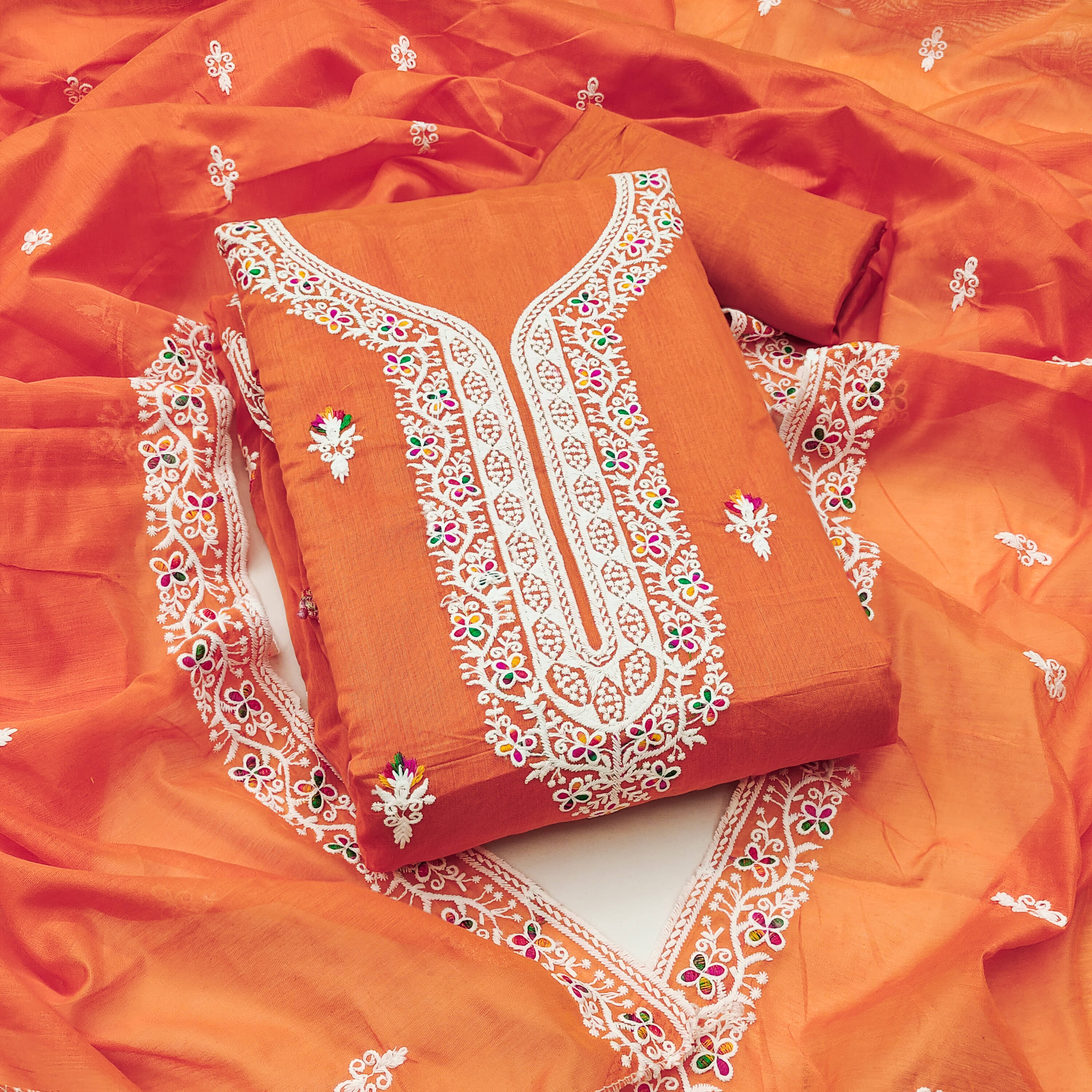Nayanthara Trends Unstitched Chanderi Embroidered Dress Material - Orange ( Pack of 1 ) Nayanthara Trends Unstitched Chanderi Embroidered Dress Material - Orange ( Pack of 1 )
