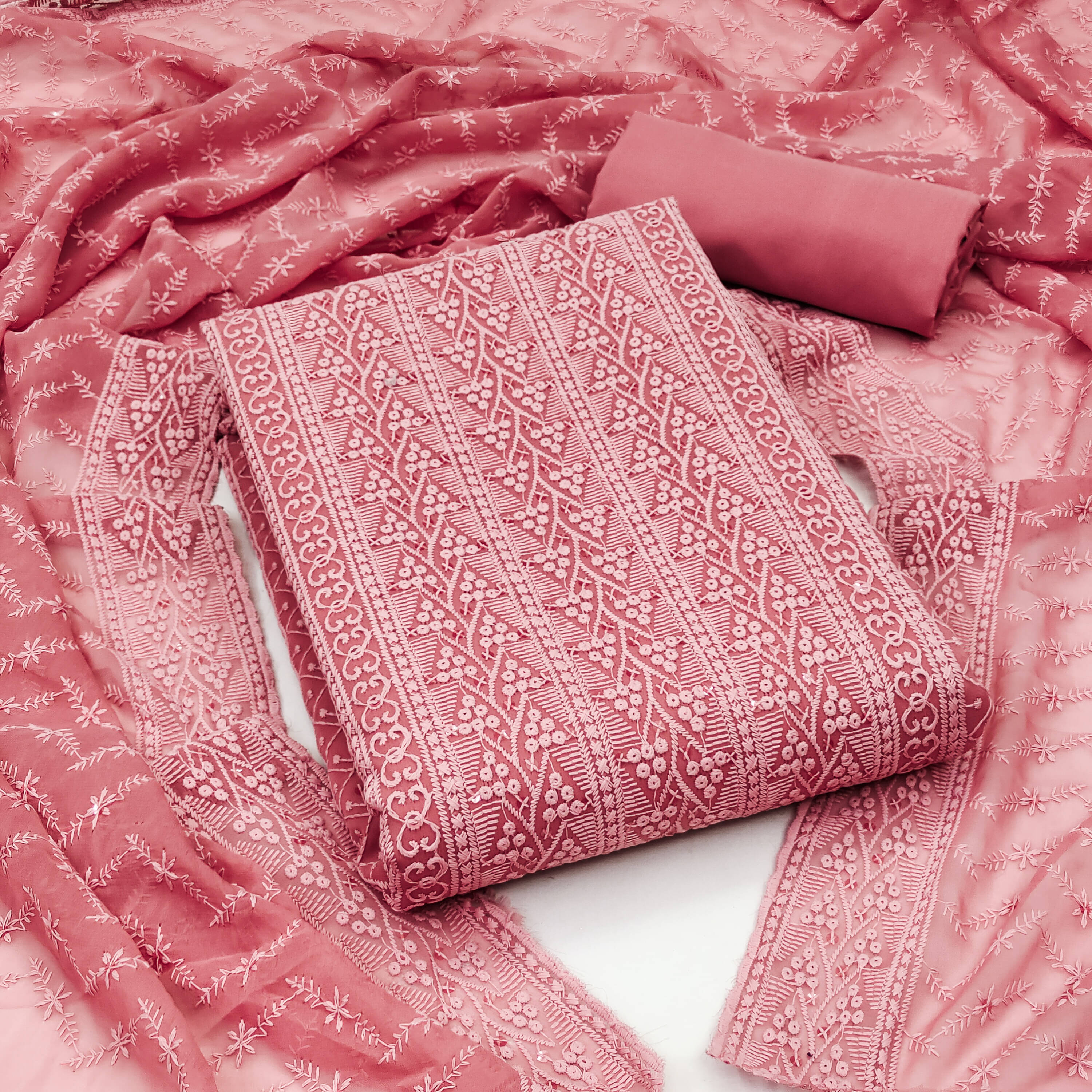 Nayanthara Trends Unstitched Georgette Embroidered Dress Material - Pink ( Pack of 1 )     			Nayanthara Trends Unstitched Georgette Embroidered Dress Material - Pink ( Pack of 1 )