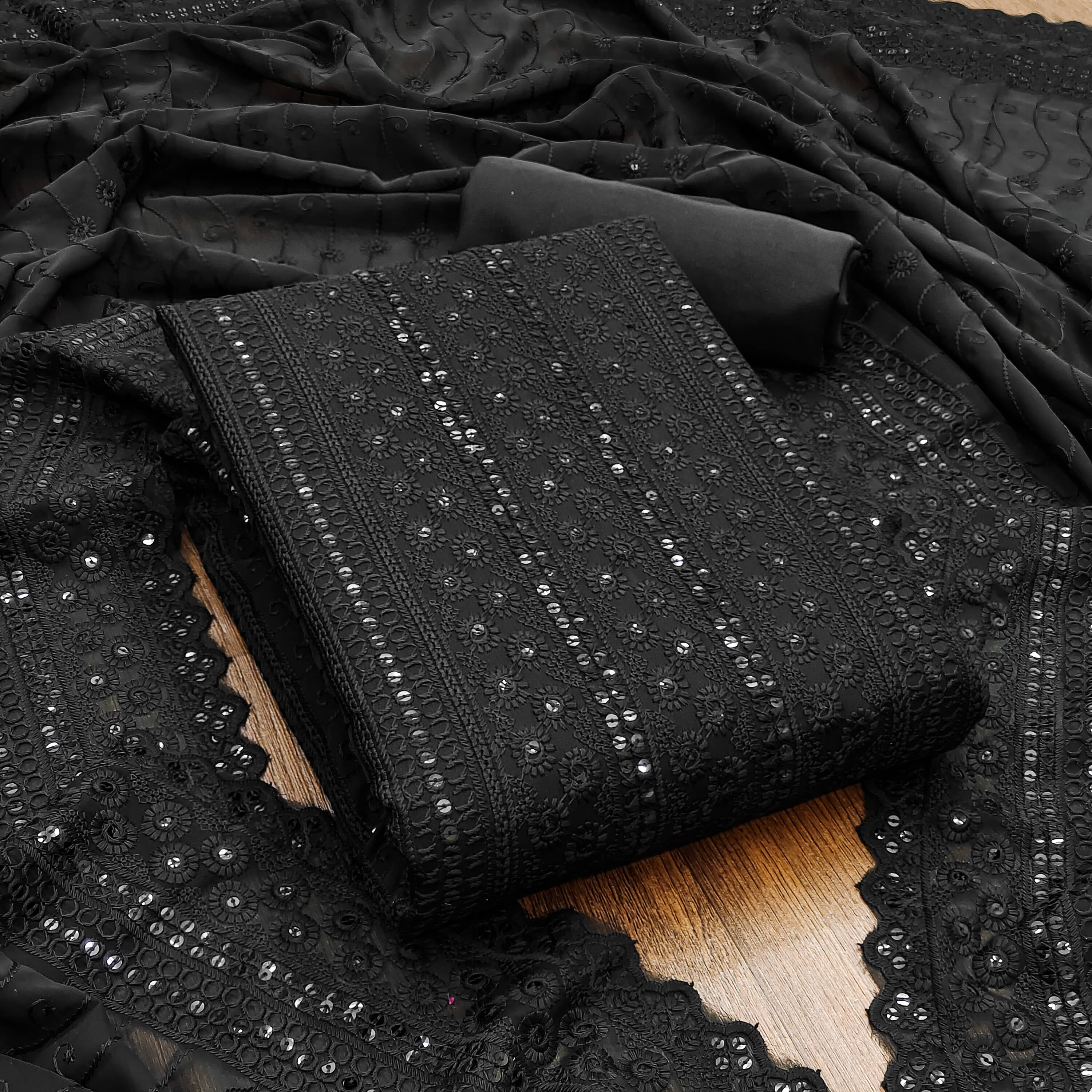 Nayanthara Trends Unstitched Georgette Embroidered Dress Material - Black ( Pack of 1 ) Nayanthara Trends Unstitched Georgette Embroidered Dress Material - Black ( Pack of 1 )