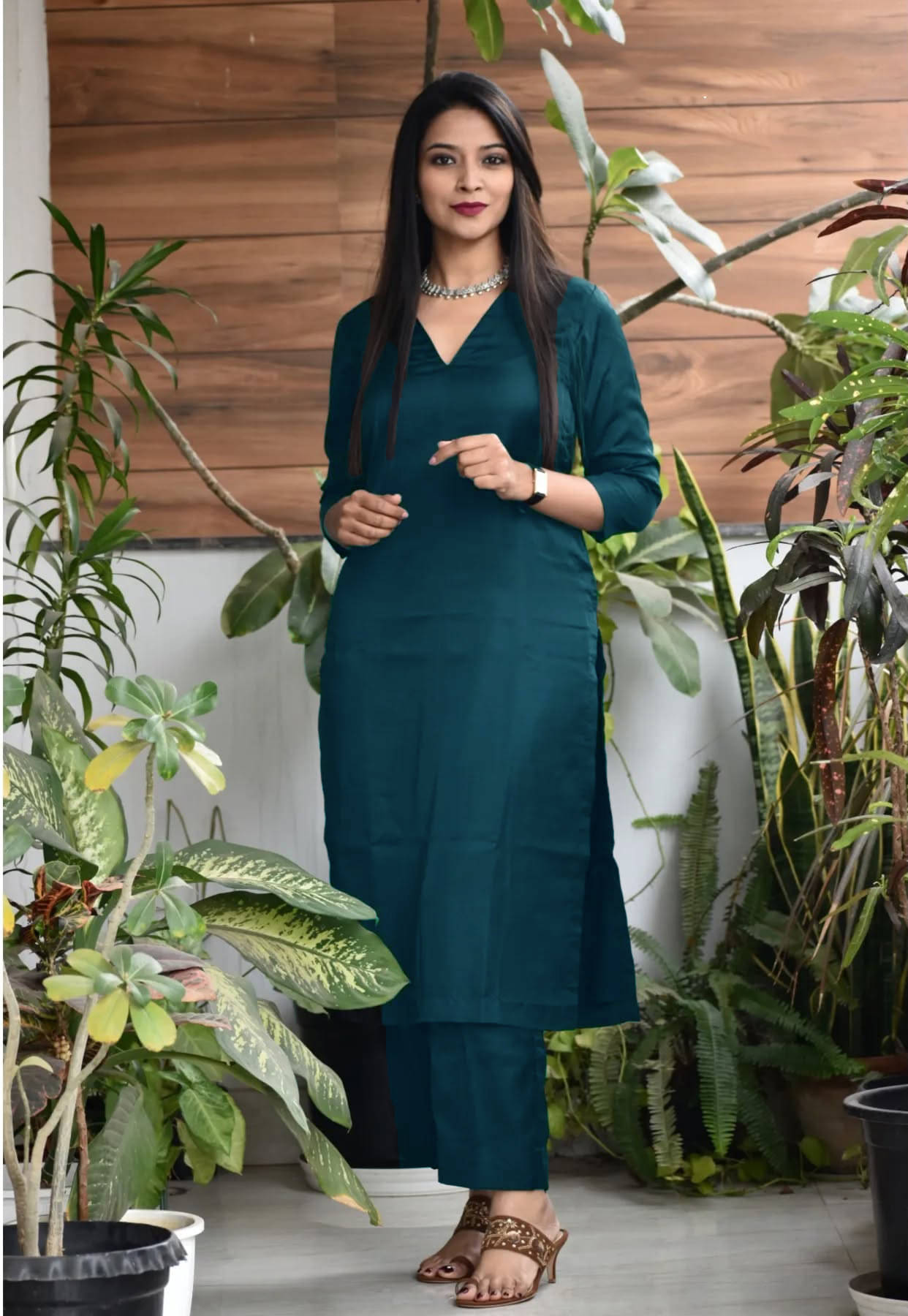     			Nirja Fab Rayon Solid Kurti With Pants Women's Stitched Salwar Suit - Teal ( Pack of 1 )