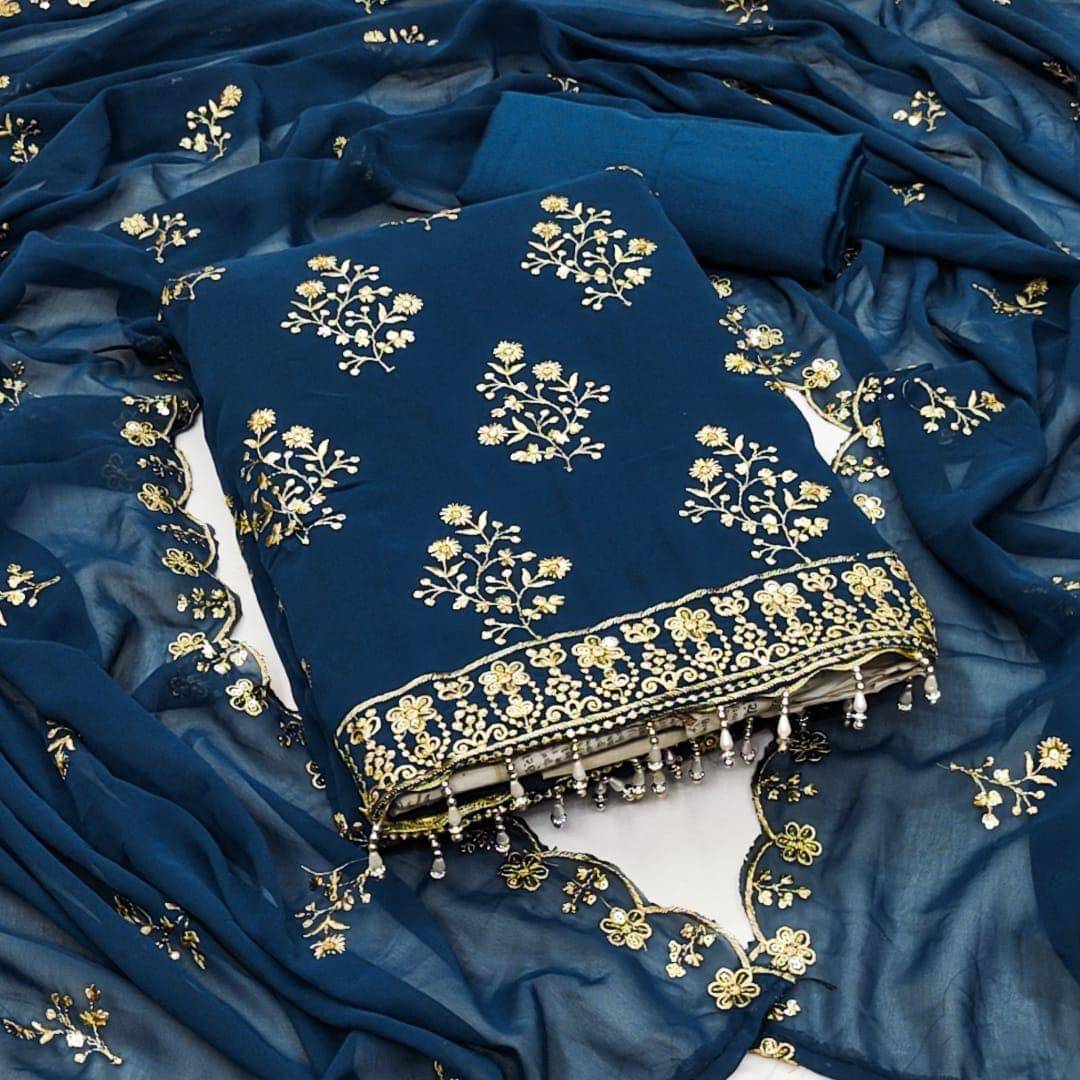 Nayanthara Trends Unstitched Georgette Embroidered Dress Material - Teal ( Pack of 1 ) Nayanthara Trends Unstitched Georgette Embroidered Dress Material - Teal ( Pack of 1 )