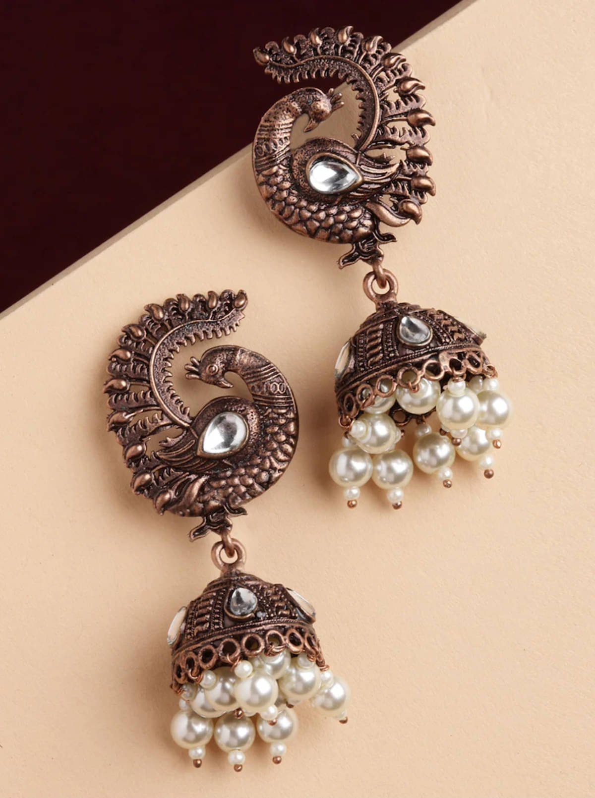     			Rhosyn Brown Jhumki Earrings ( Pack of 1 )