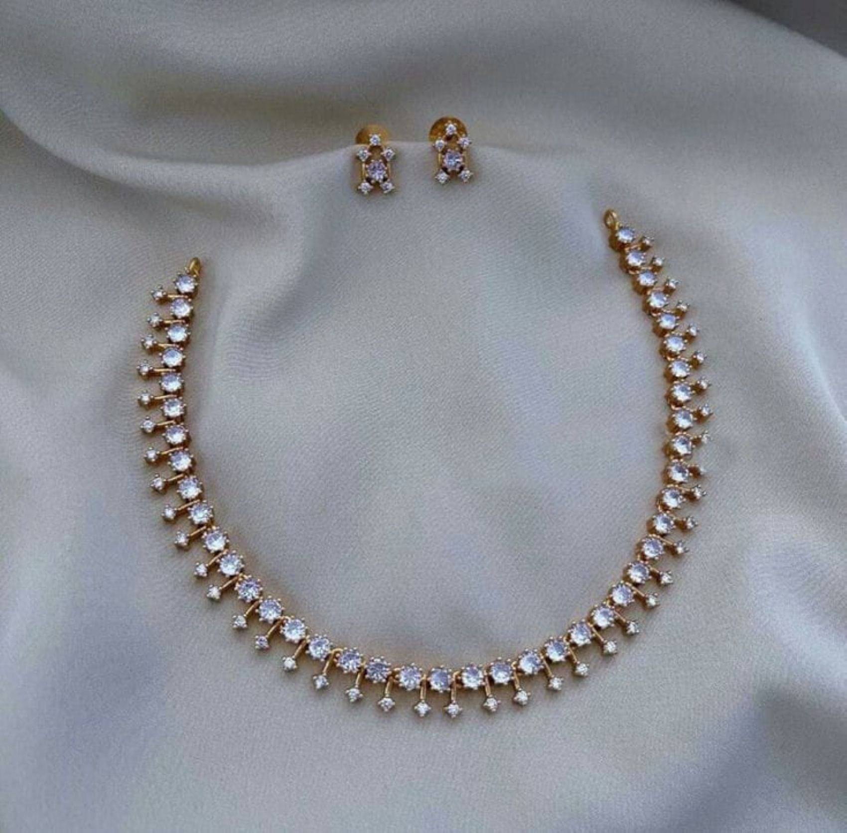     			Pamadhya White Copper Necklace Set ( Pack of 1 )
