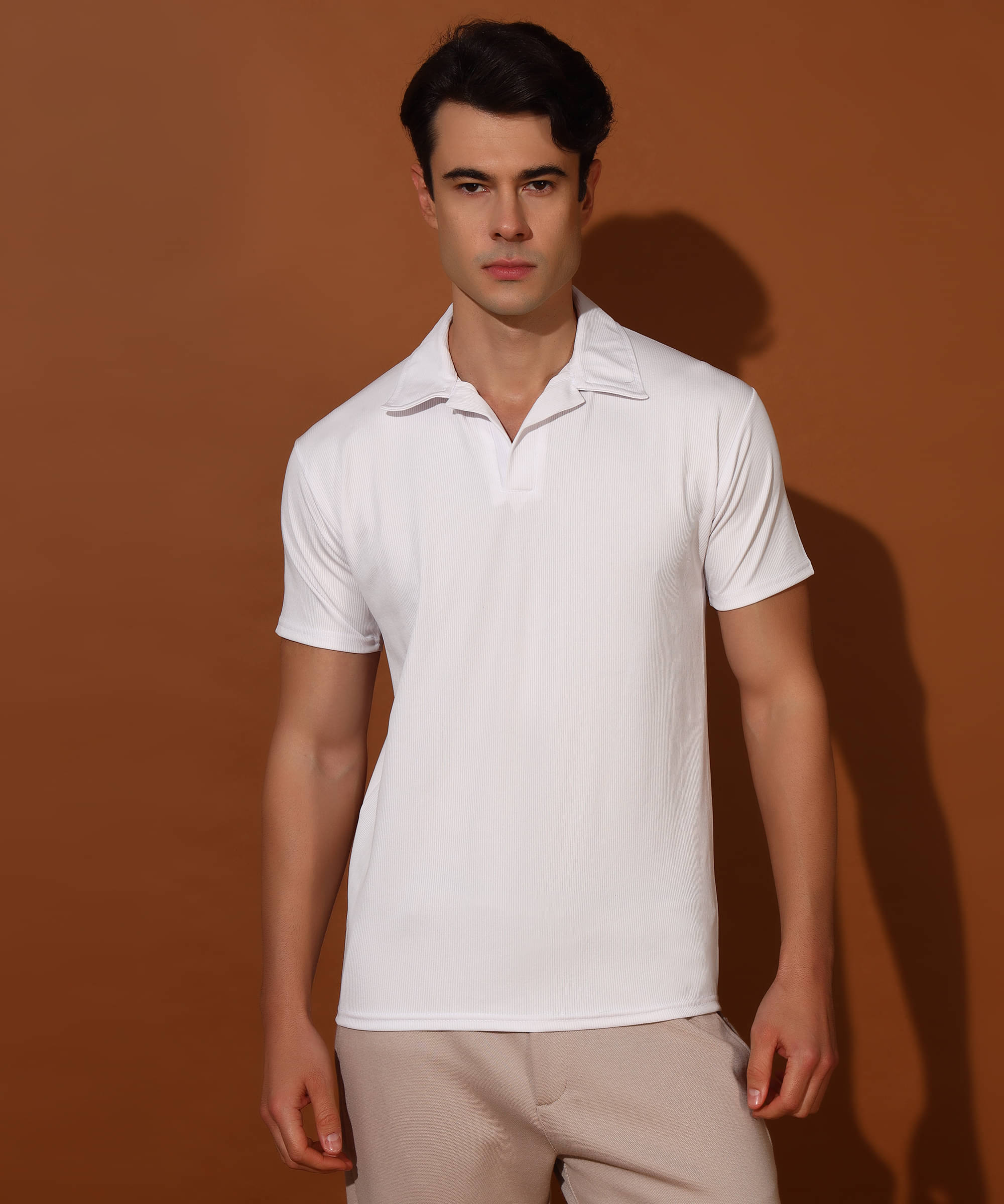 Christy World Pack of 1 Polyester Regular Fit Solid Half Sleeves Men's Polo T Shirt ( White )     			Christy World Pack of 1 Polyester Regular Fit Solid Half Sleeves Men's Polo T Shirt ( White )