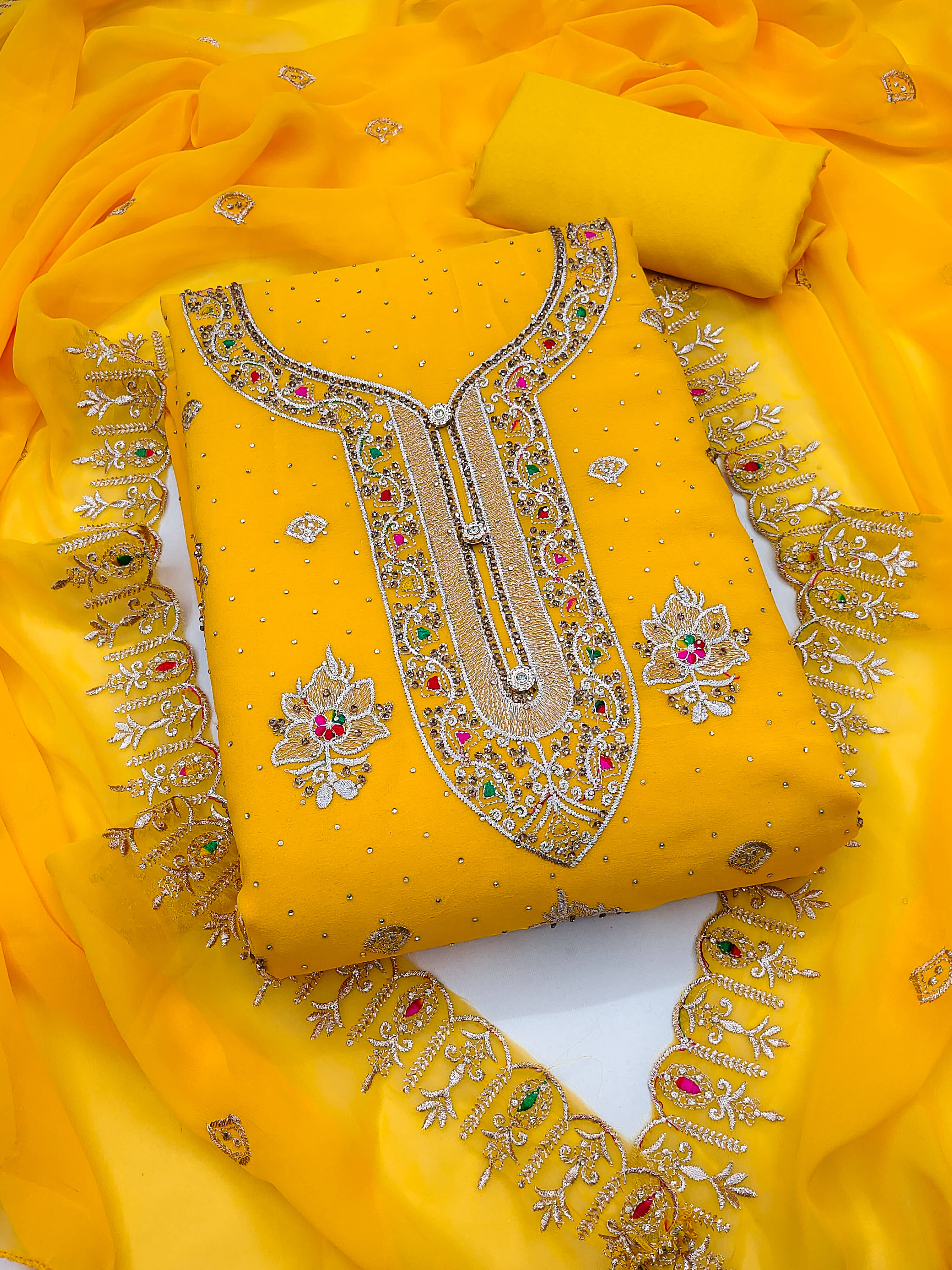 Nayanthara Trends Unstitched Georgette Embroidered Dress Material - Yellow ( Pack of 1 ) Nayanthara Trends Unstitched Georgette Embroidered Dress Material - Yellow ( Pack of 1 )