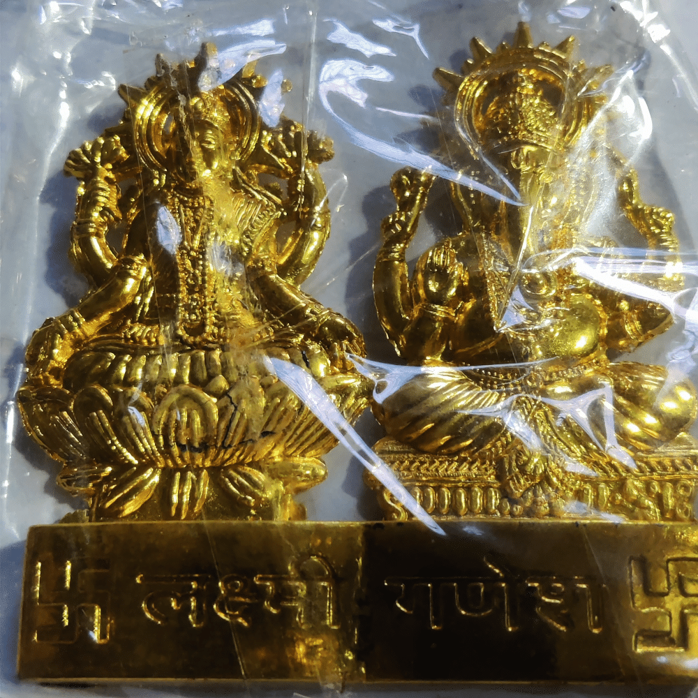     			wellsome marketing Laxmi Ganesh Ideal For Car Dashboard ( Pack of 1 )