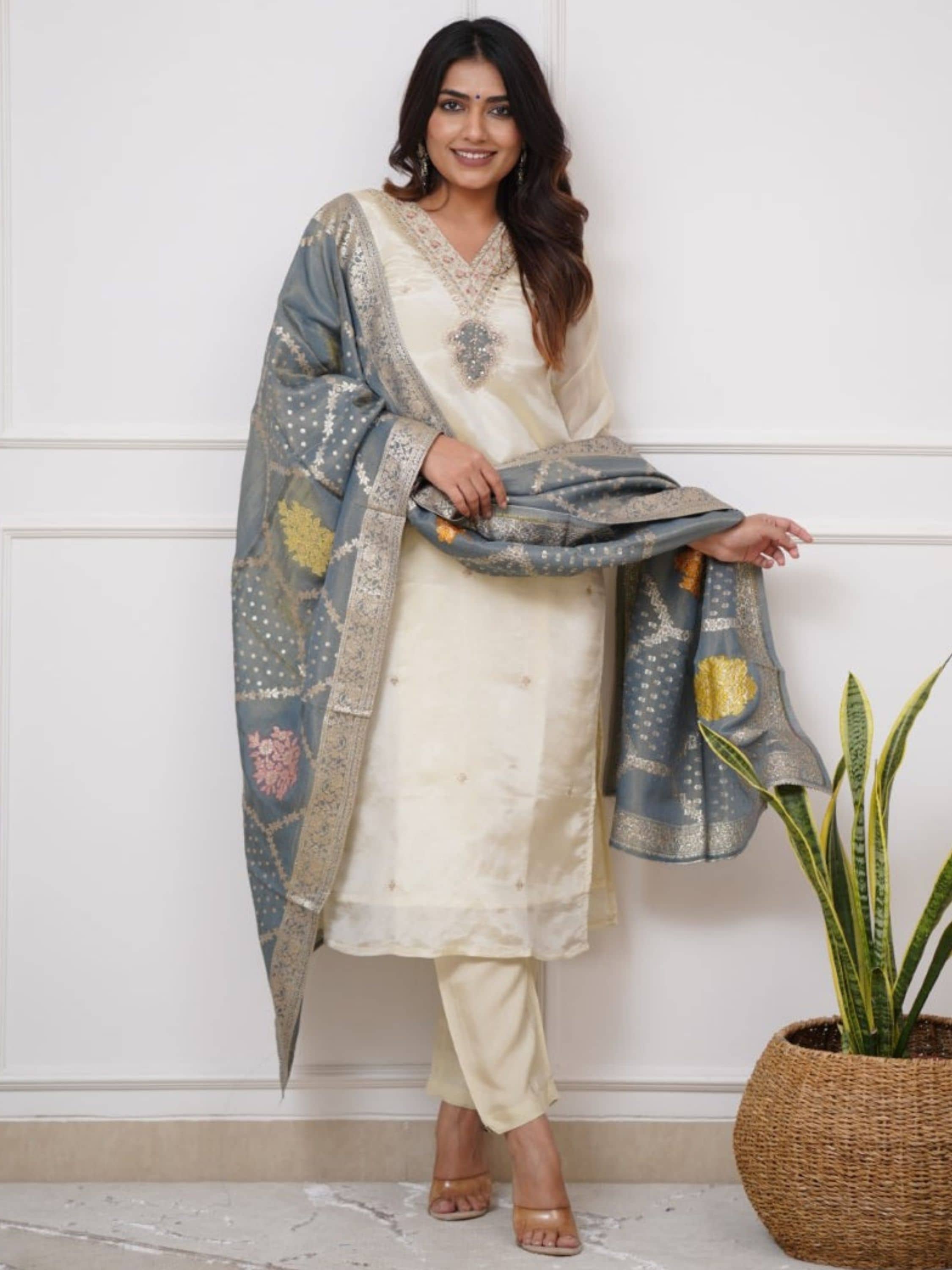 Niza Fashion Viscose Embroidered Kurti With Pants Women's Stitched Salwar Suit - Cream ( Pack of 1 )