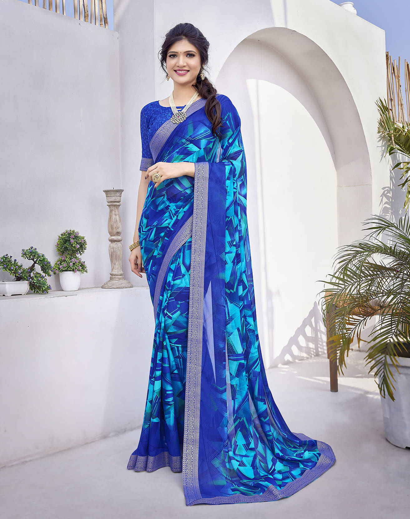Yashika Georgette Printed Saree With Unstitched Blouse Piece ( Blue ) Yashika Georgette Printed Saree With Unstitched Blouse Piece ( Blue )
