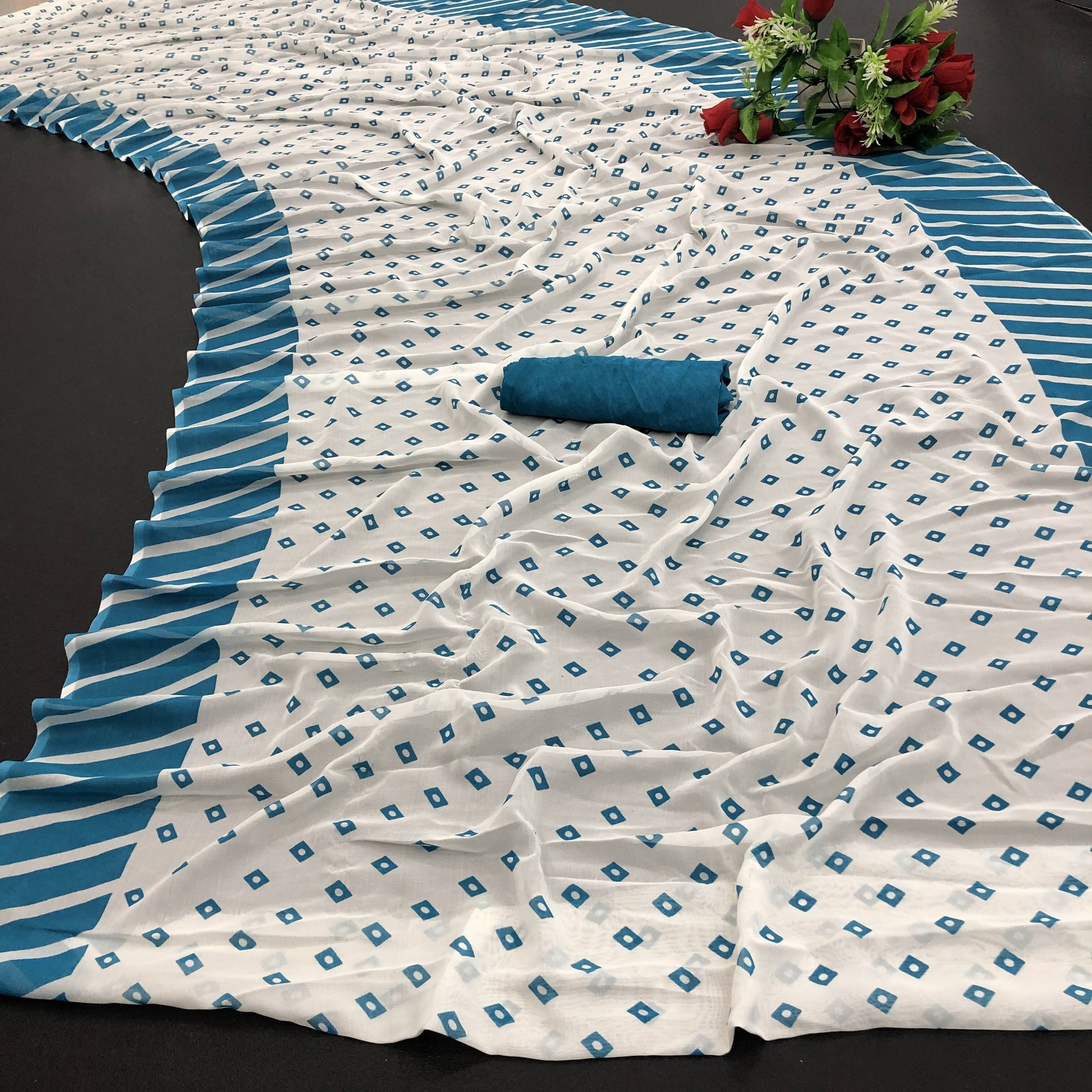 Yashika Georgette Printed Saree With Unstitched Blouse Piece ( Light Blue )     			Yashika Georgette Printed Saree With Unstitched Blouse Piece ( Light Blue )