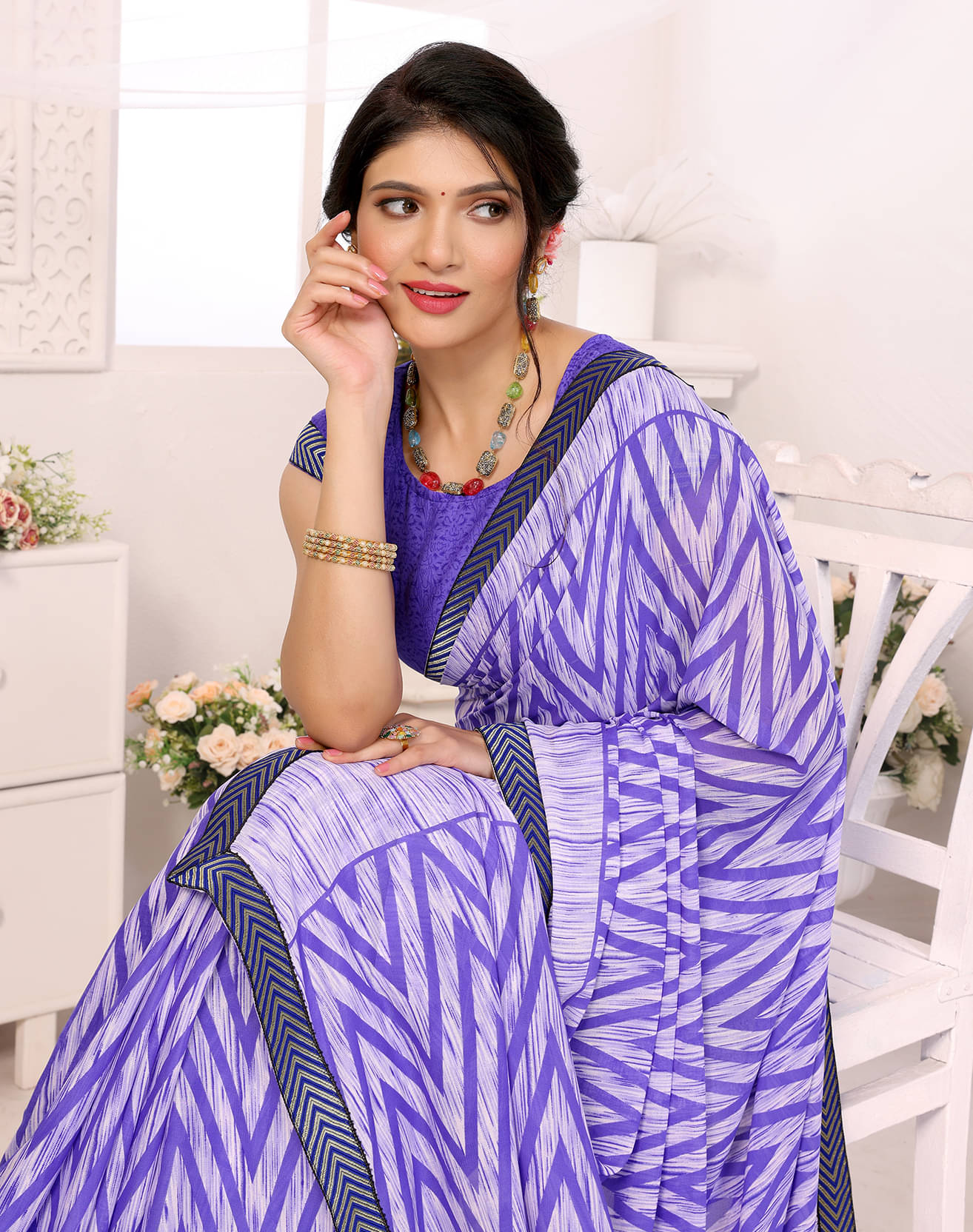     			Yashika Georgette Printed Saree With Unstitched Blouse Piece ( Purple )