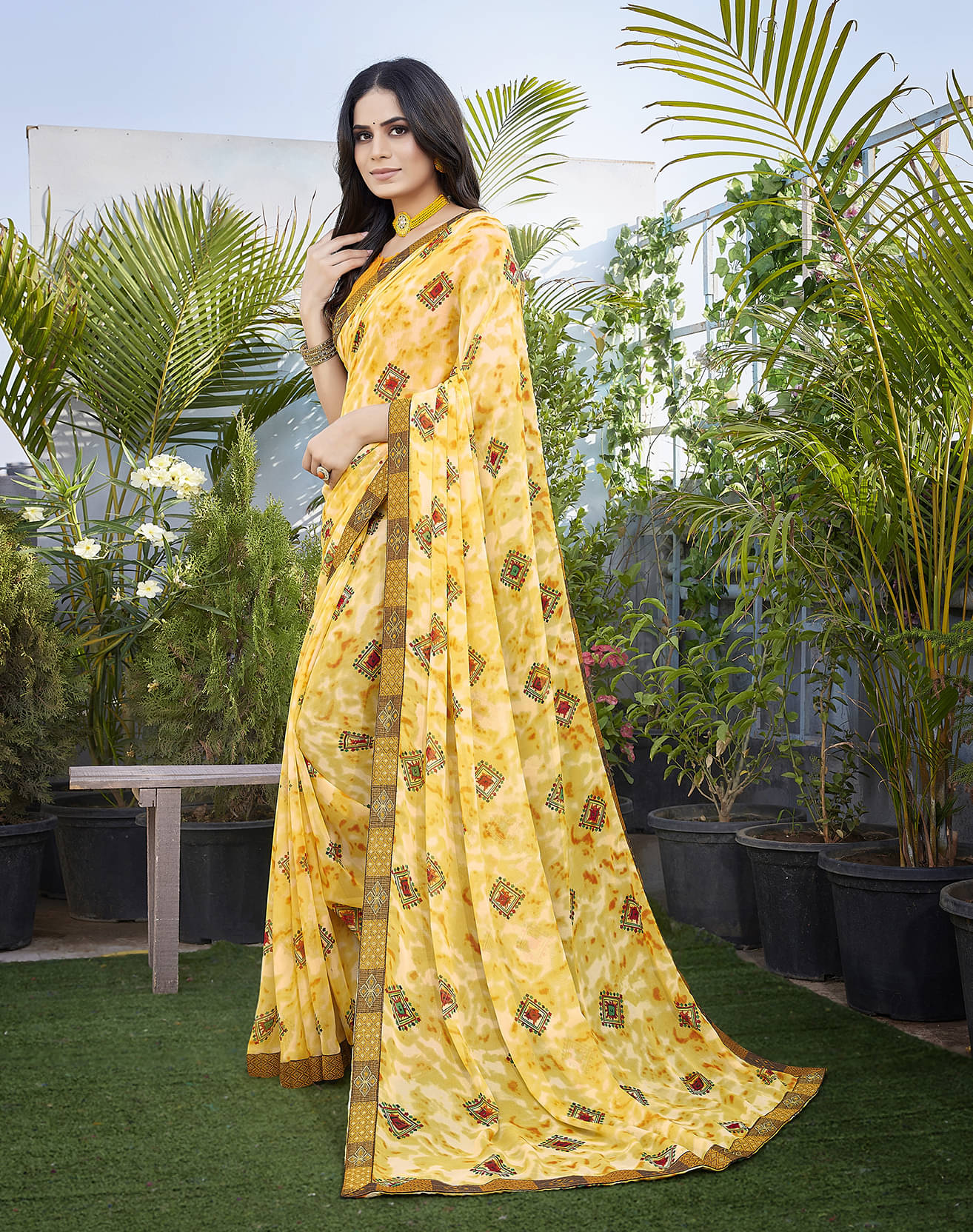     			Yashika Georgette Printed Saree With Unstitched Blouse Piece ( Yellow )