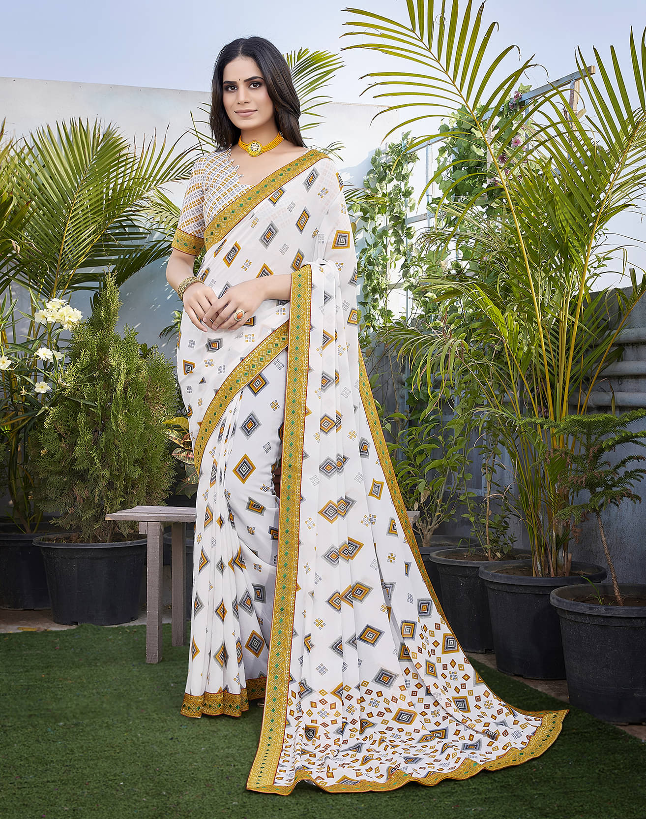Yashika Georgette Printed Saree With Unstitched Blouse Piece ( Yellow ) Yashika Georgette Printed Saree With Unstitched Blouse Piece ( Yellow )