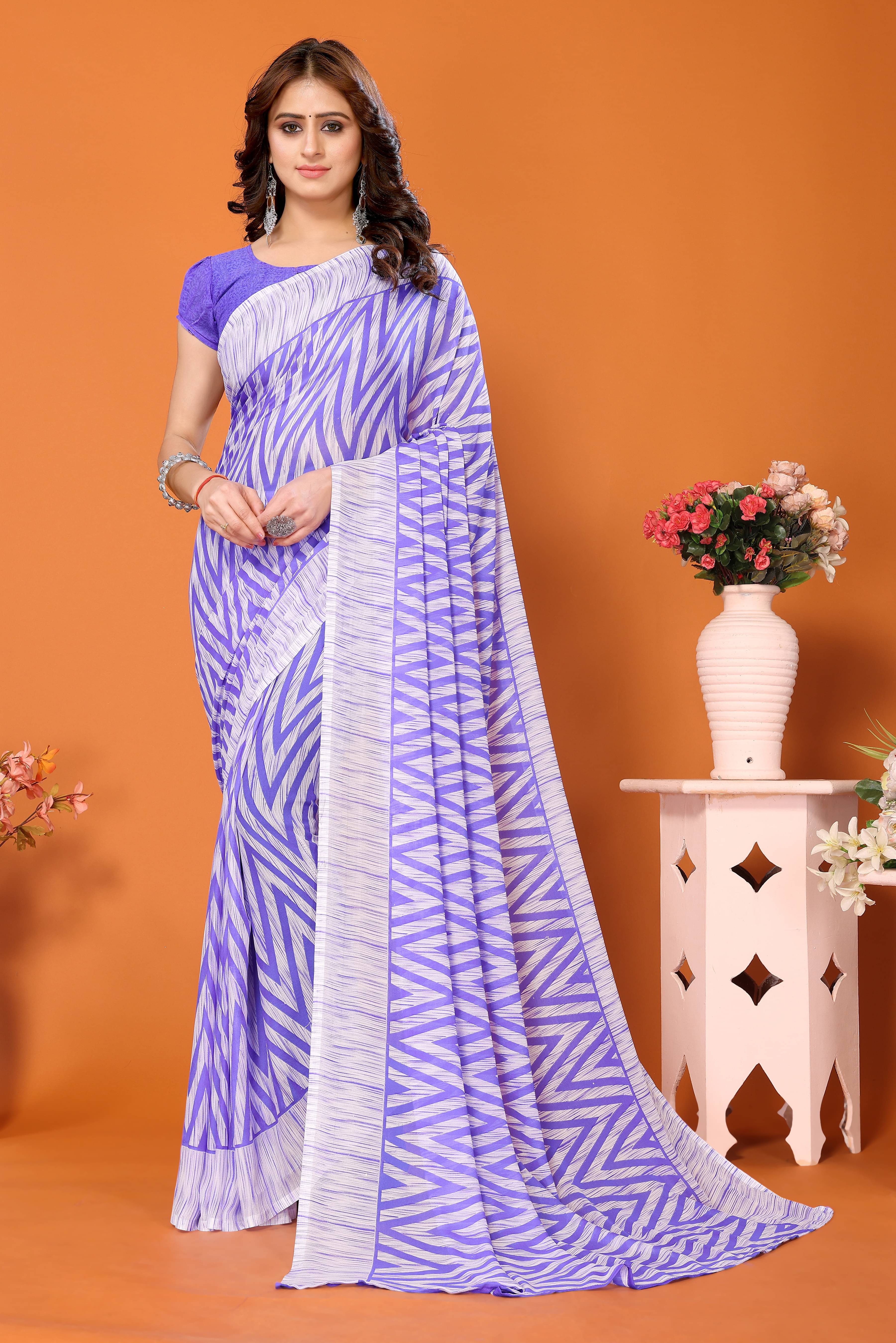     			Yashika Georgette Printed Saree With Unstitched Blouse Piece ( Purple )