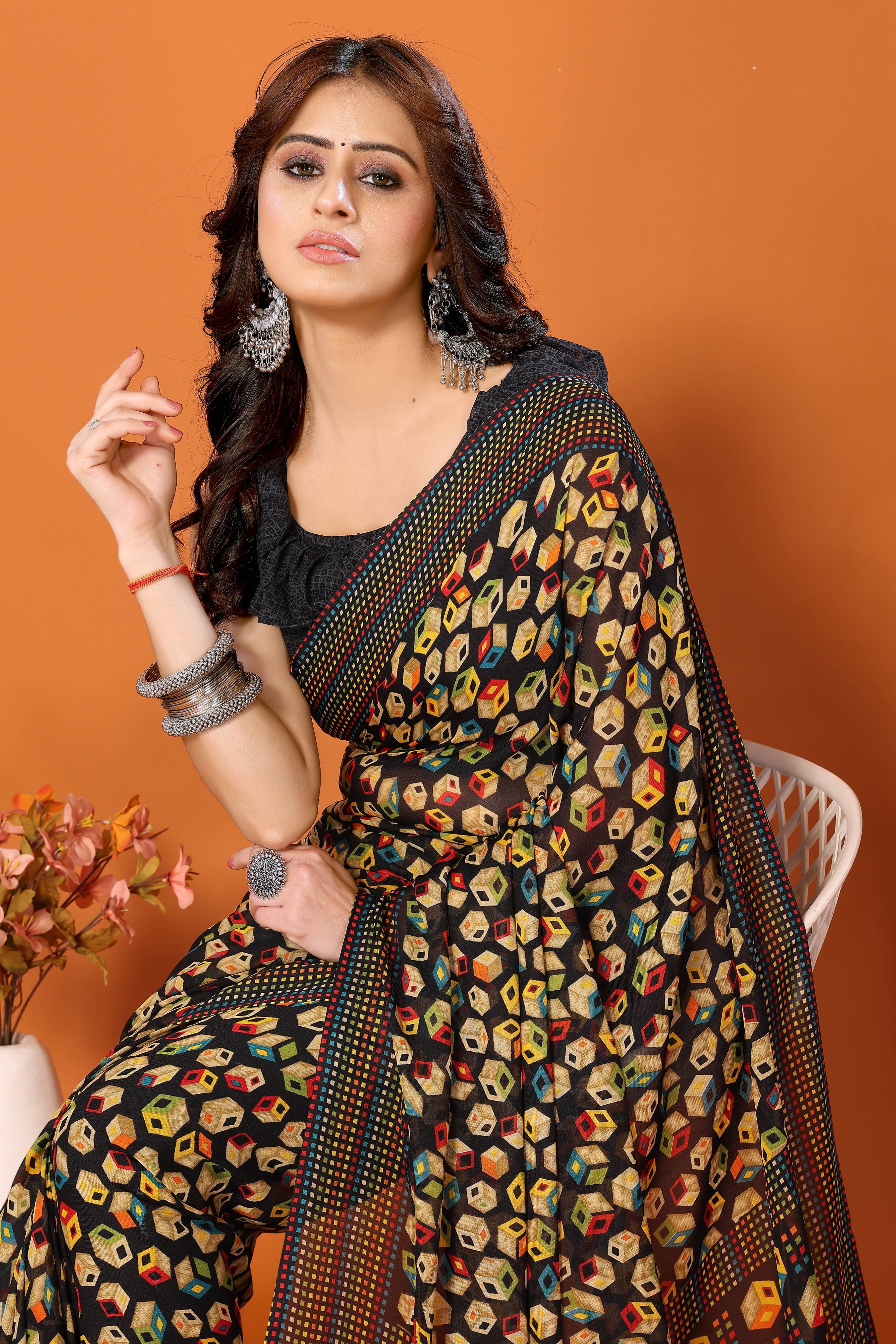 Yashika Georgette Printed Saree With Unstitched Blouse Piece ( Black ) Yashika Georgette Printed Saree With Unstitched Blouse Piece ( Black )