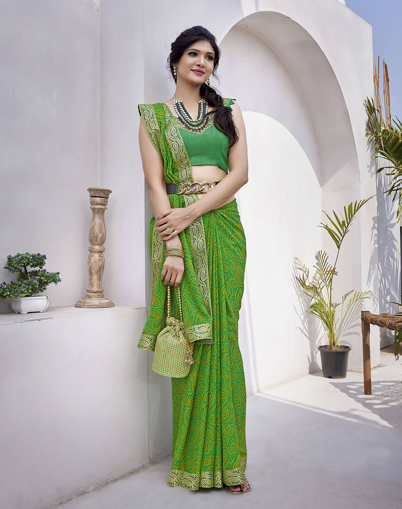     			Yashika Georgette Printed Saree With Unstitched Blouse Piece ( Green )