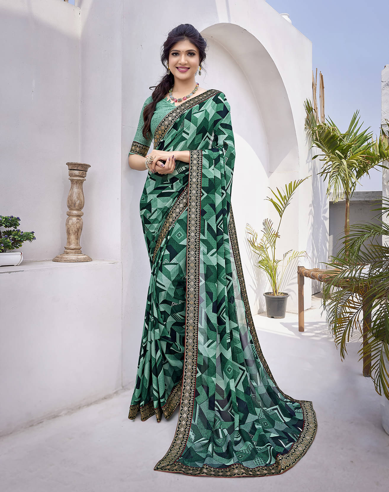     			Yashika Georgette Printed Saree With Unstitched Blouse Piece ( Green )