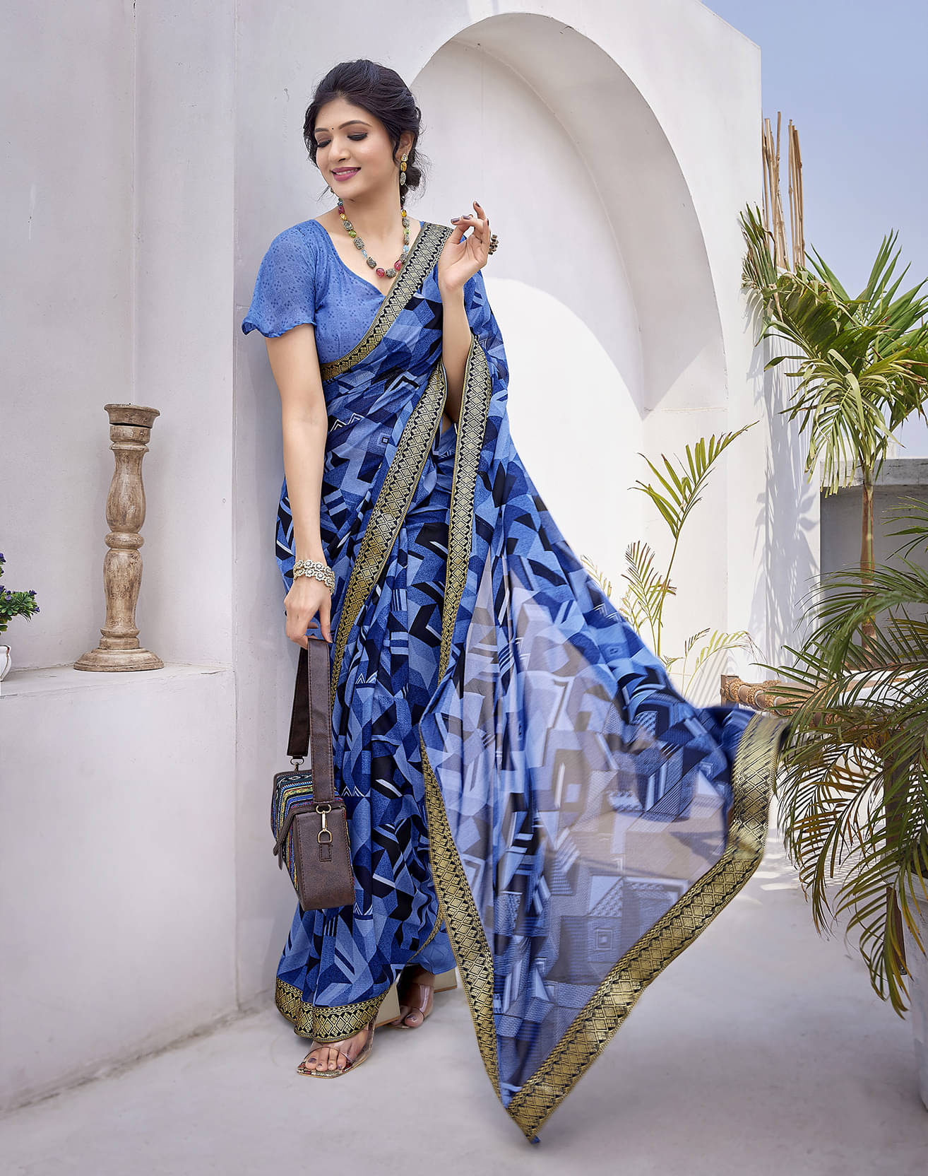Yashika Georgette Printed Saree With Unstitched Blouse Piece ( Blue ) Yashika Georgette Printed Saree With Unstitched Blouse Piece ( Blue )
