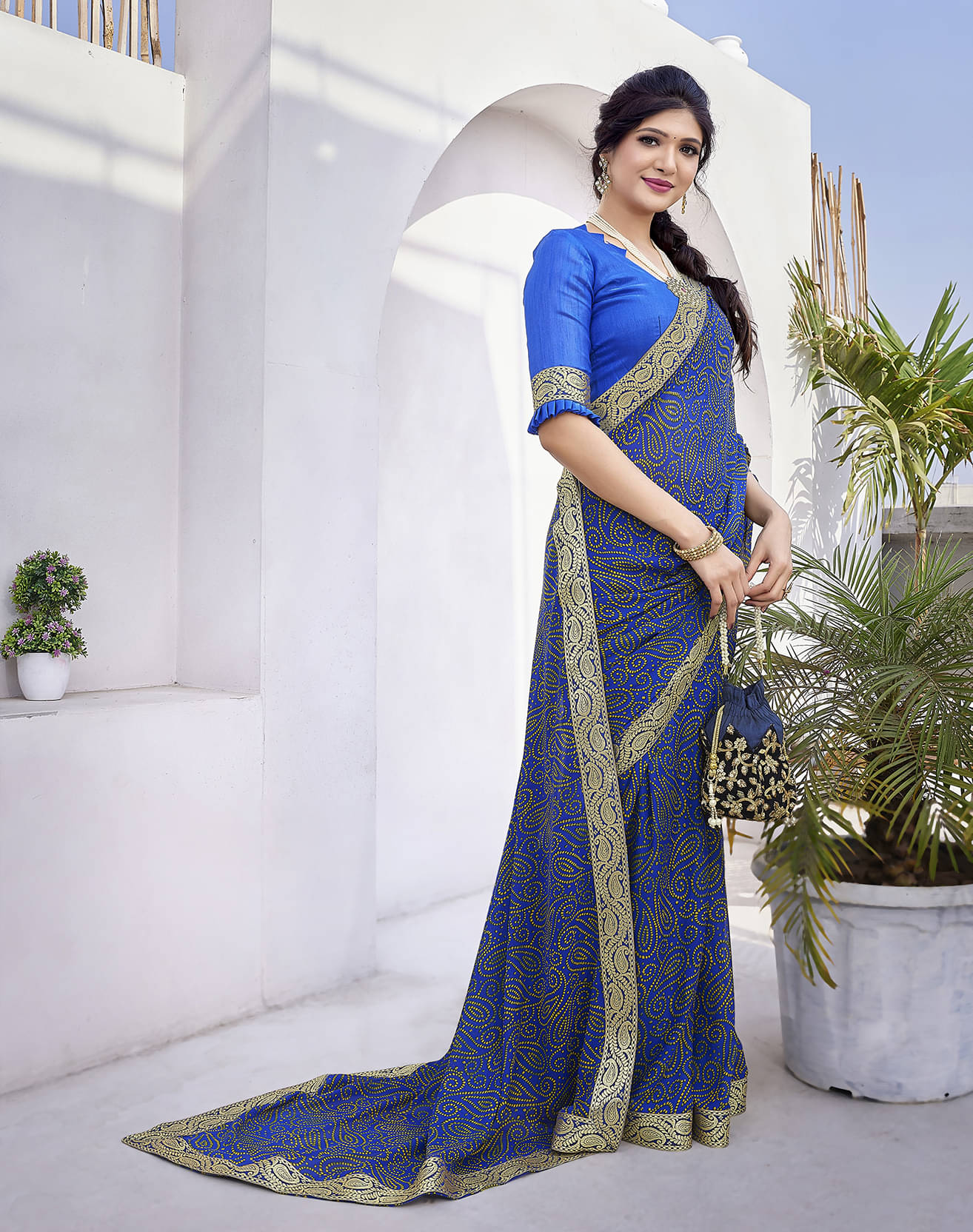    			Yashika Georgette Printed Saree With Unstitched Blouse Piece ( Blue )