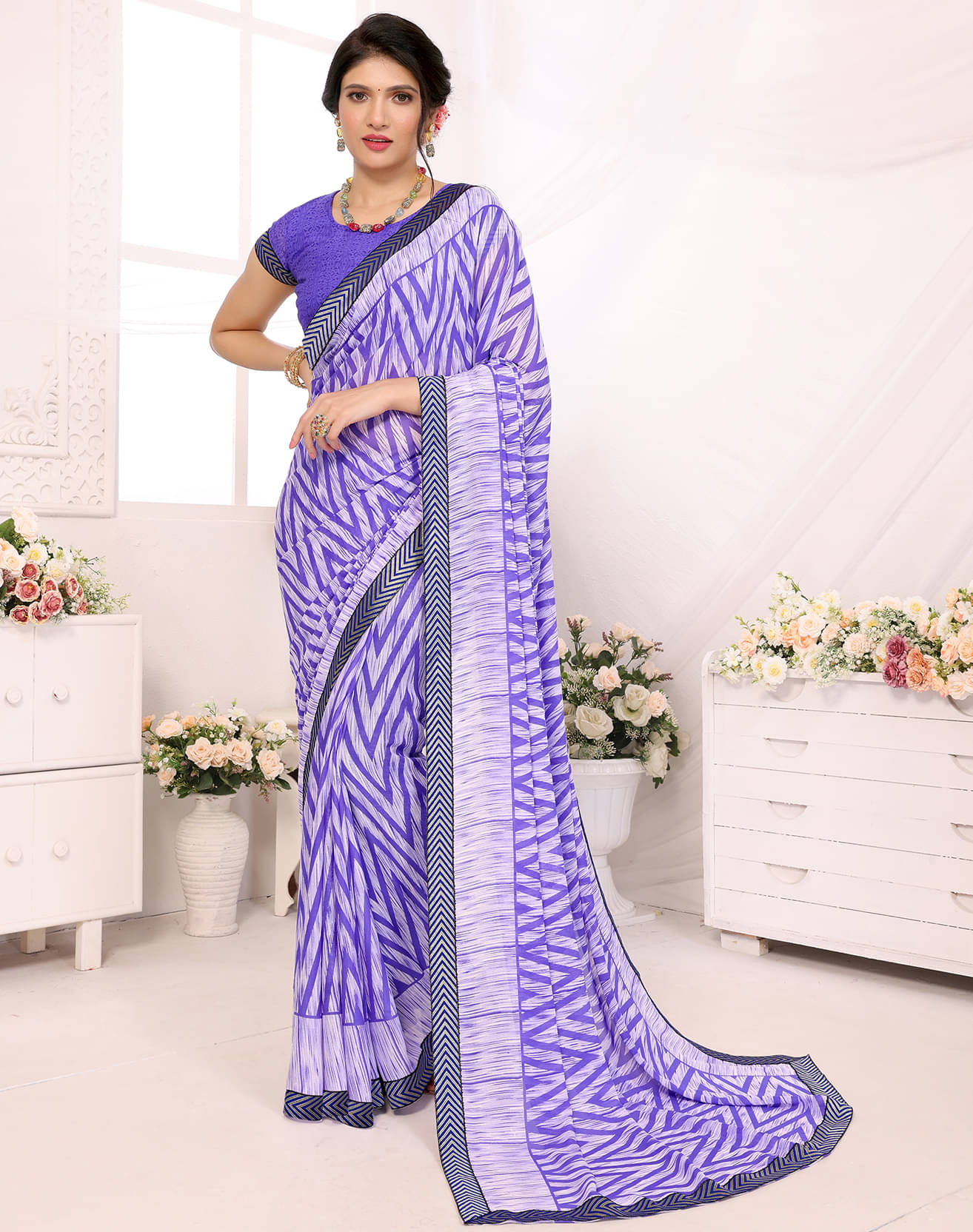 Yashika Georgette Printed Saree With Unstitched Blouse Piece ( Purple ) Yashika Georgette Printed Saree With Unstitched Blouse Piece ( Purple )