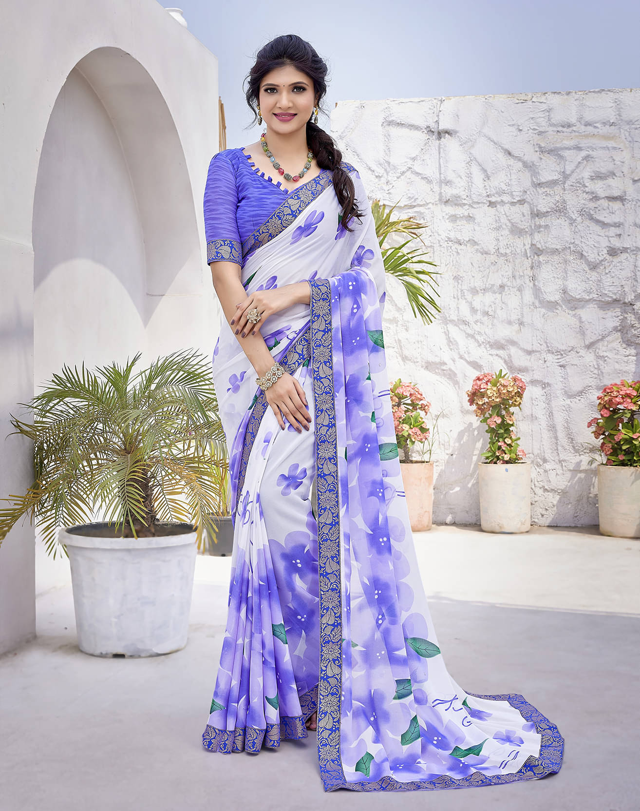     			Yashika Georgette Printed Saree With Unstitched Blouse Piece ( Purple )
