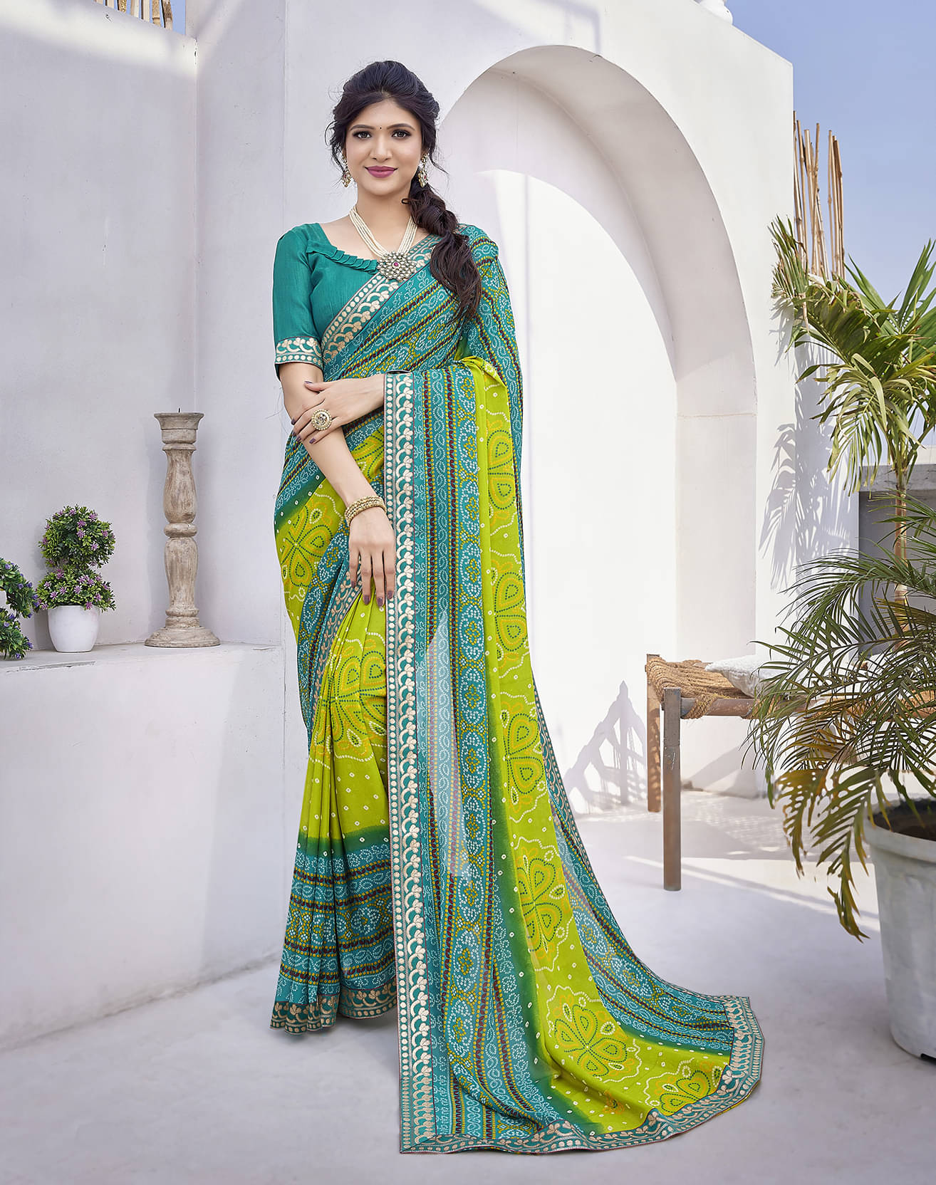     			Yashika Georgette Printed Saree With Unstitched Blouse Piece ( Blue )