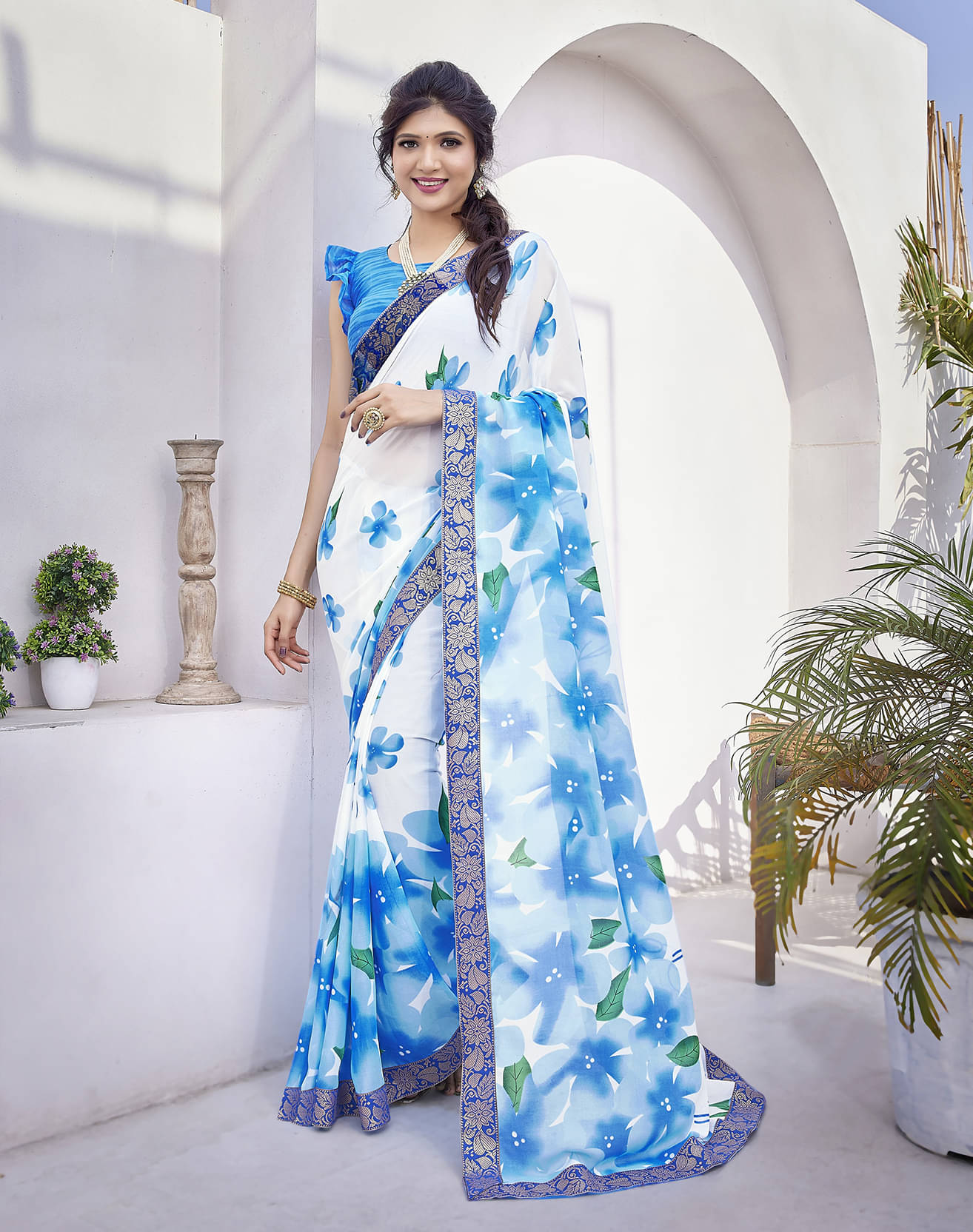     			Yashika Georgette Printed Saree With Unstitched Blouse Piece ( Blue )