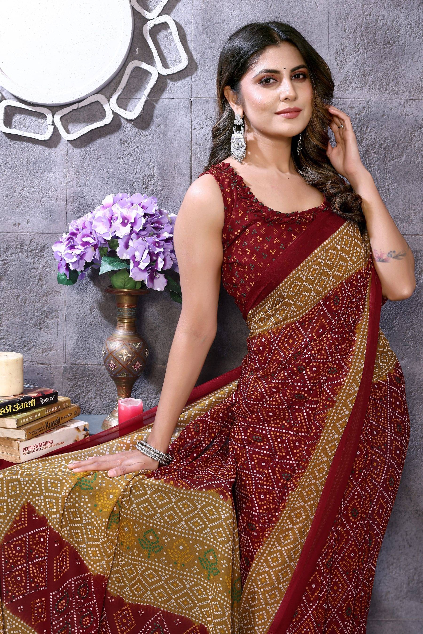 Yashika Georgette Printed Saree With Unstitched Blouse Piece ( Maroon ) Yashika Georgette Printed Saree With Unstitched Blouse Piece ( Maroon )