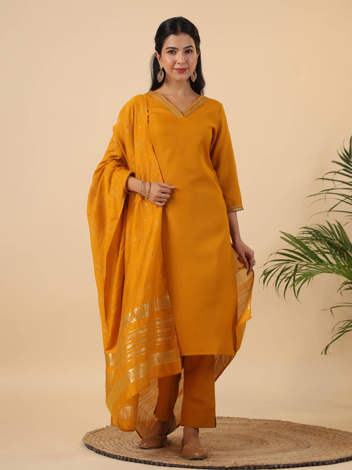 Janasya Cotton Blend Solid Kurti With Pants Women's Stitched Salwar Suit - Mustard ( Pack of 1 )     			Janasya Cotton Blend Solid Kurti With Pants Women's Stitched Salwar Suit - Mustard ( Pack of 1 )