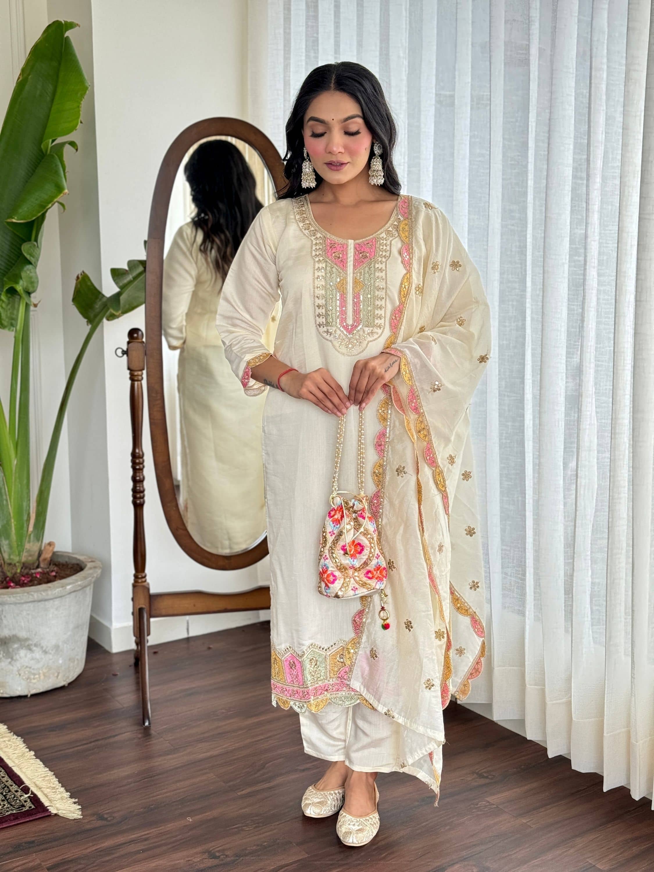 Niza Fashion Viscose Embroidered Kurti With Pants Women's Stitched Salwar Suit - Cream ( Pack of 1 )