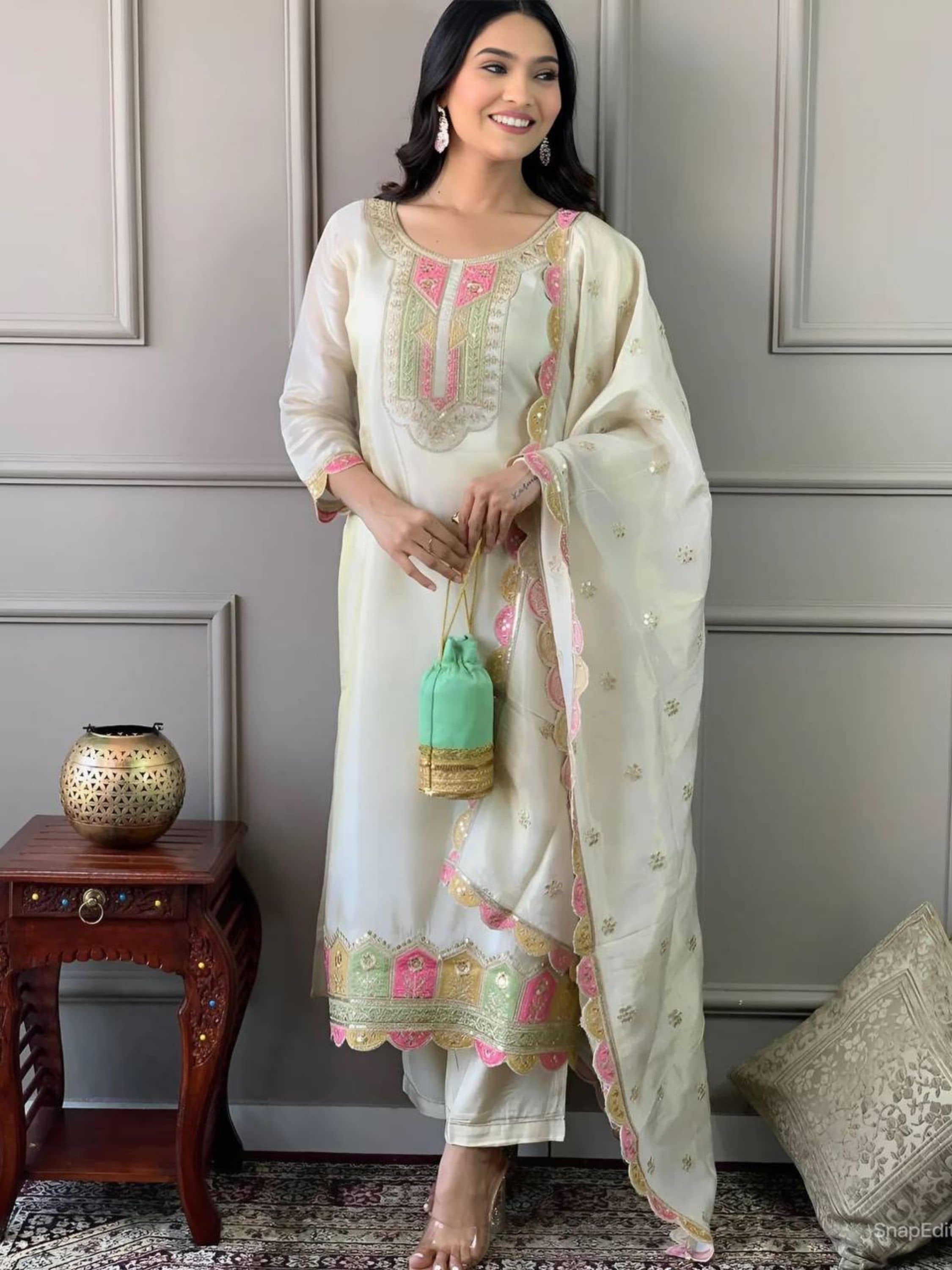 Niza Fashion Viscose Embroidered Kurti With Pants Women's Stitched Salwar Suit - Cream ( Pack of 1 )