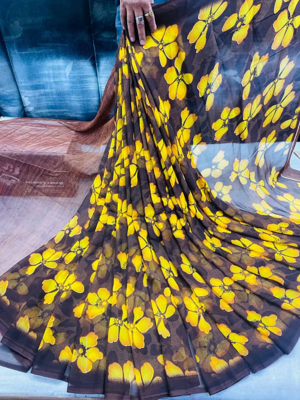     			Sitanjali Georgette Printed Saree With Unstitched Blouse Piece ( Brown )