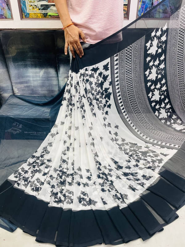     			Sitanjali Georgette Printed Saree With Unstitched Blouse Piece ( Black )