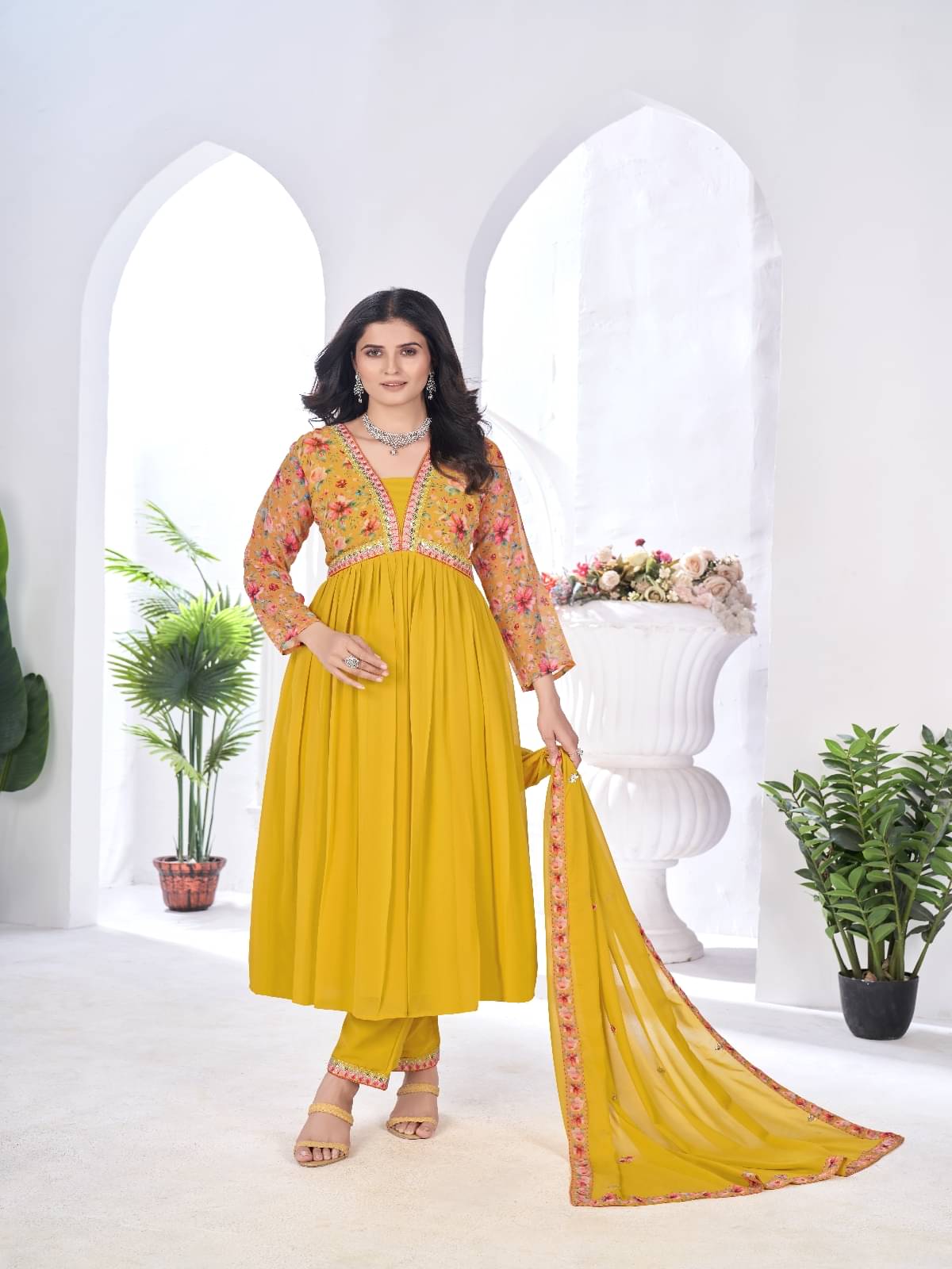 Varni Fabrics Georgette Printed Kurti With Pants Women's Stitched Salwar Suit - Yellow ( Pack of 1 ) Varni Fabrics Georgette Printed Kurti With Pants Women's Stitched Salwar Suit - Yellow ( Pack of 1 )