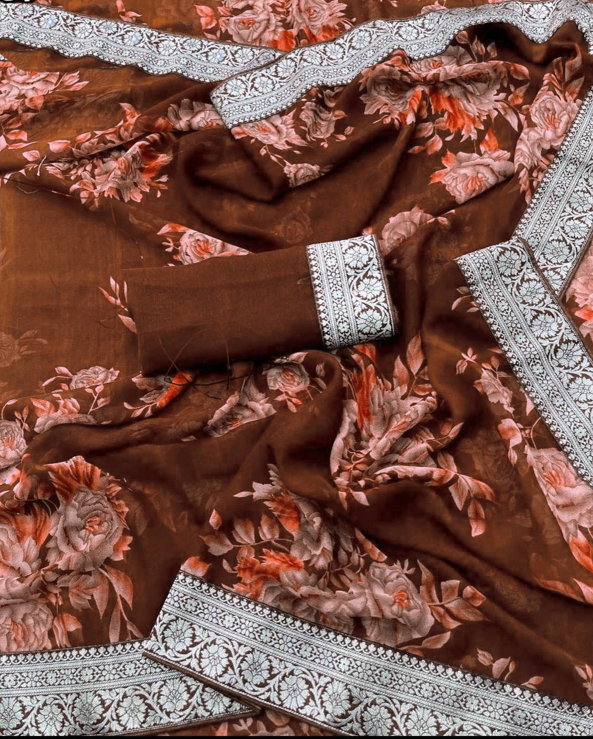 Bhuwal Fashion Georgette Printed Saree With Unstitched Blouse Piece ( Brown ) Bhuwal Fashion Georgette Printed Saree With Unstitched Blouse Piece ( Brown )
