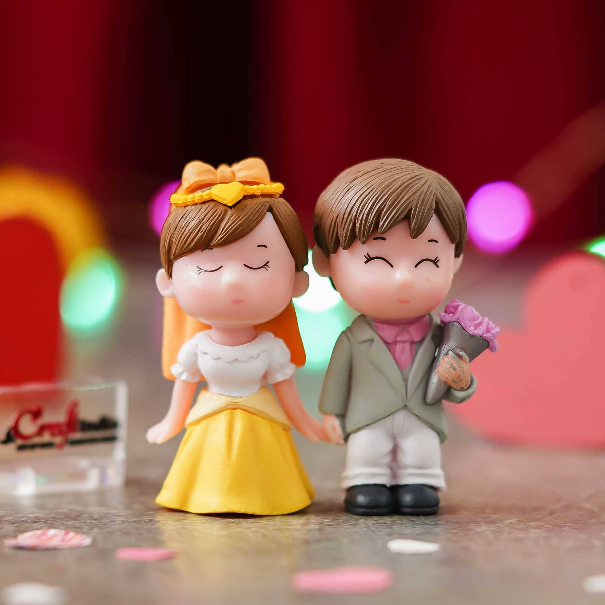 eCraftIndia Multicolor Resin Couple Figurine eCraftIndia Multicolor Resin Couple Figurine