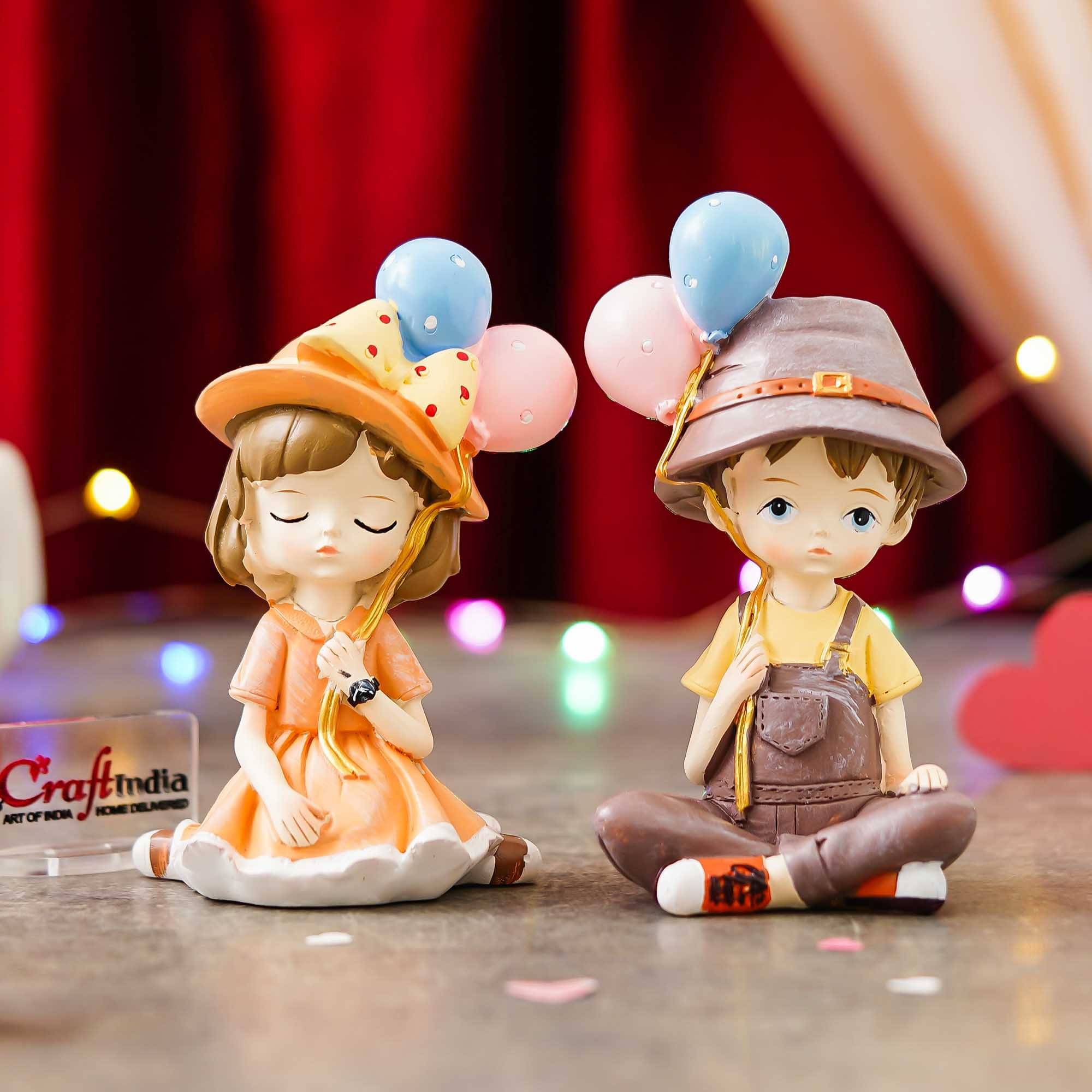 eCraftIndia Multicolor Resin Couple Figurine eCraftIndia Multicolor Resin Couple Figurine