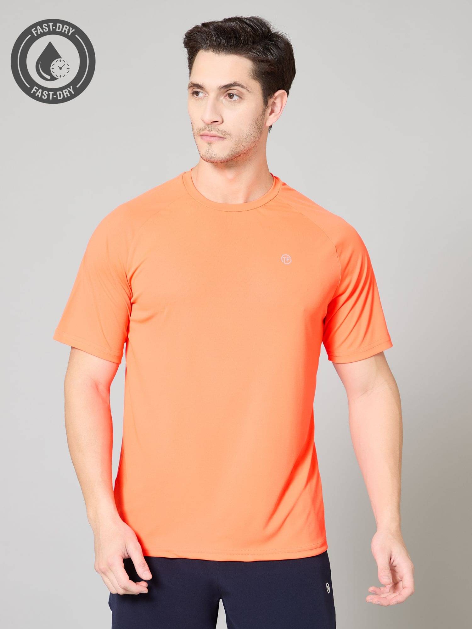 Turnfit Polyester Regular Fit Solid Half Sleeves Men's Round T-Shirt - Orange ( Pack of 1 ) Turnfit Polyester Regular Fit Solid Half Sleeves Men's Round T-Shirt - Orange ( Pack of 1 )