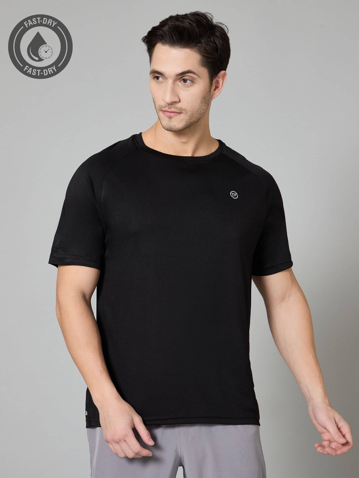     			Turnfit Polyester Regular Fit Solid Half Sleeves Men's Round T-Shirt - Black ( Pack of 1 )