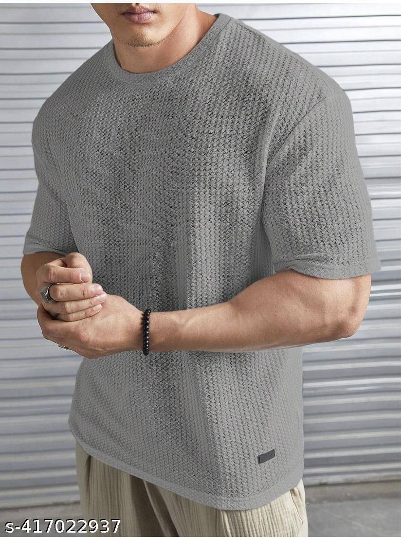 TAZO Cotton Blend Oversized Fit Self Design Half Sleeves Men's Round T-Shirt - Grey ( Pack of 1 ) TAZO Cotton Blend Oversized Fit Self Design Half Sleeves Men's Round T-Shirt - Grey ( Pack of 1 )